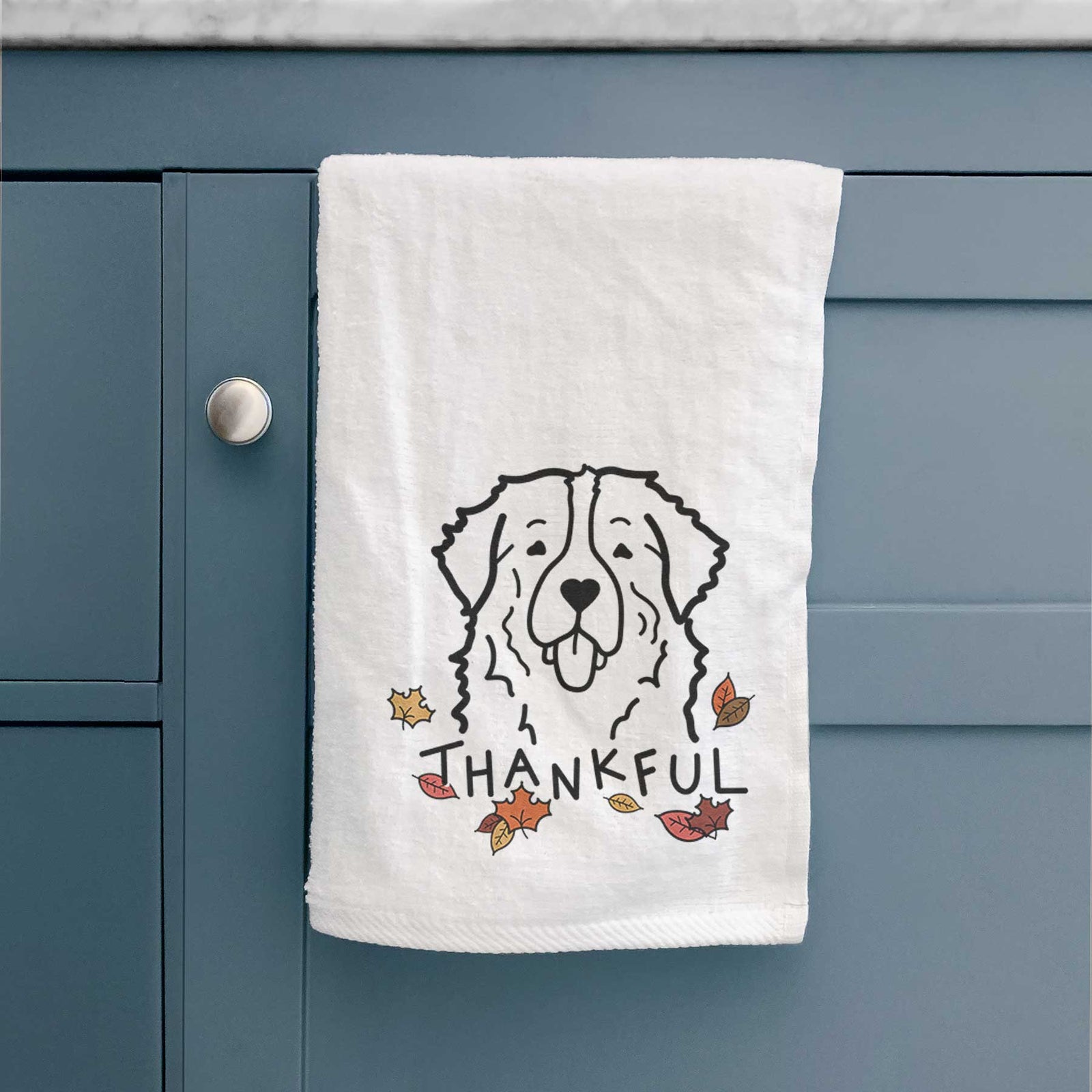 Minimalist line drawing of a Bernese Mountain Dog with 'Thankful' lettering on a decorative hand towel