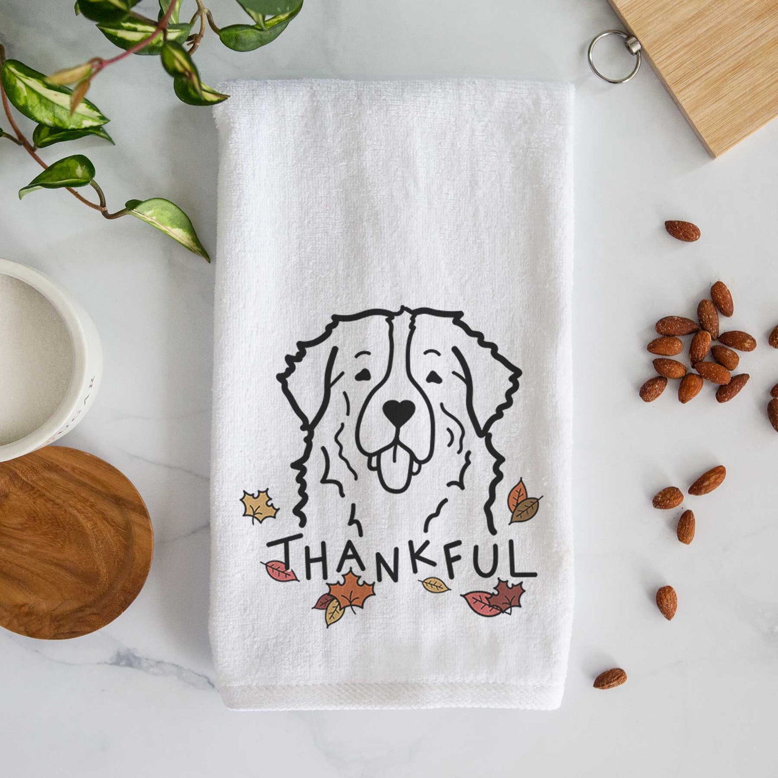 Minimalist line drawing of a Bernese Mountain Dog with 'Thankful' lettering on a decorative hand towel