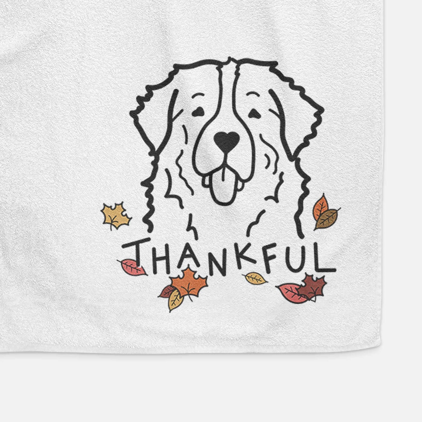 Minimalist line drawing of a Bernese Mountain Dog with 'Thankful' lettering on a decorative hand towel