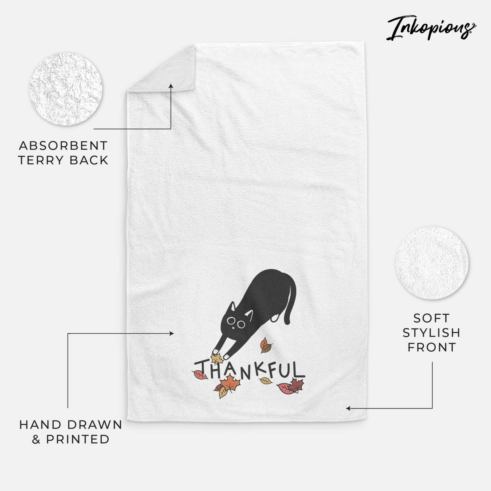 Minimalist line drawing of Bug the Black Cat with 'Thankful' lettering on a decorative hand towel