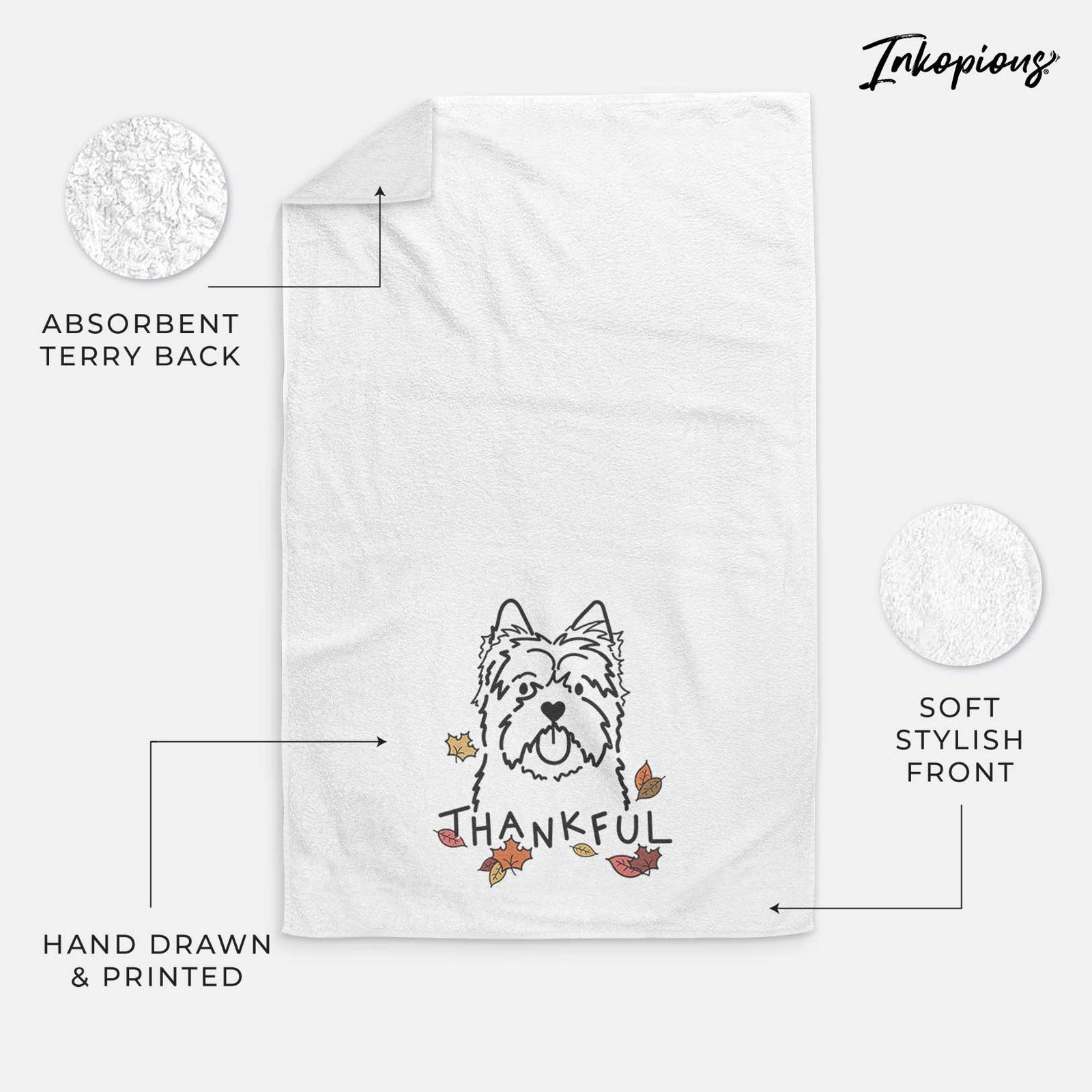 Minimalist line drawing of a Cairn Terrier with 'Thankful' lettering on a decorative hand towel