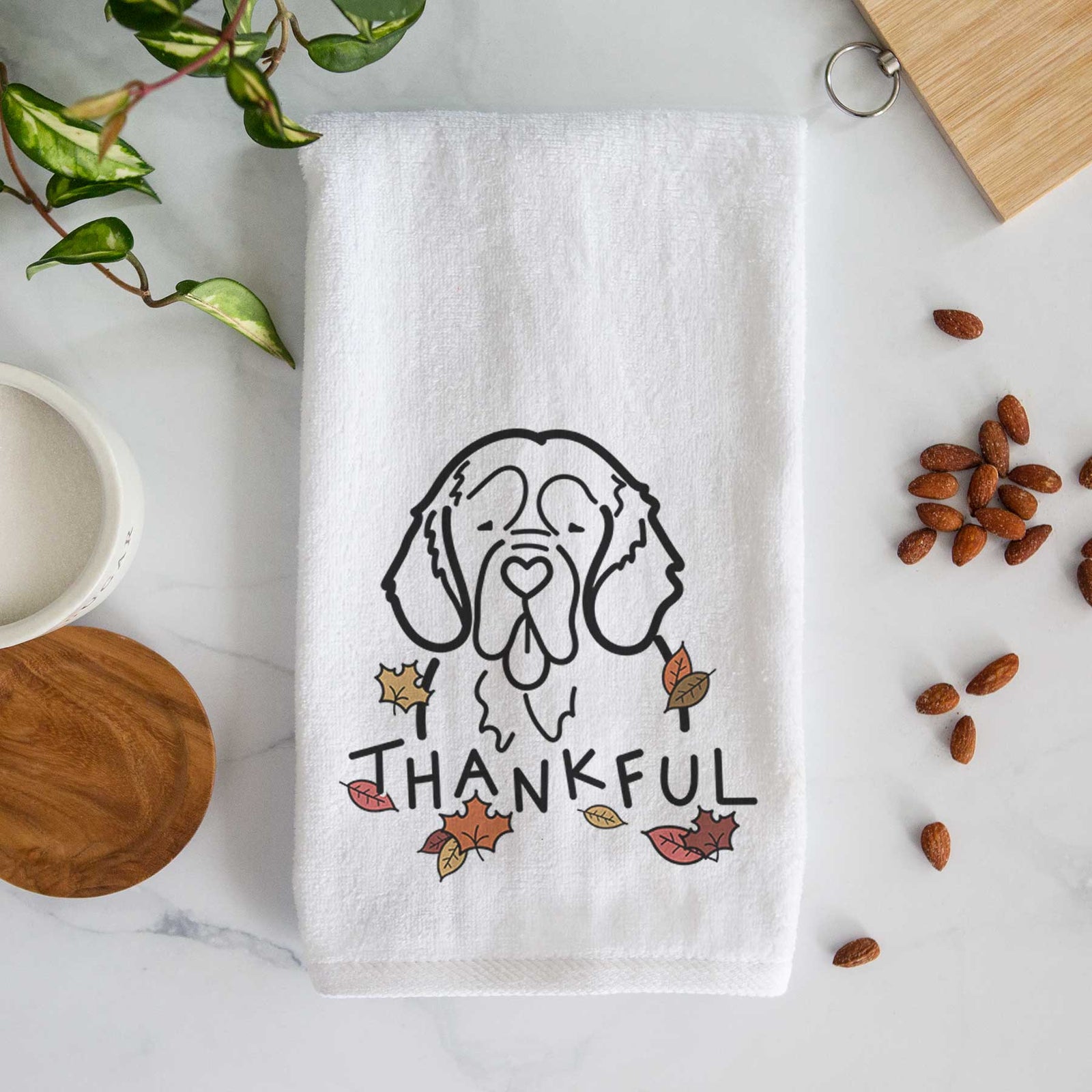 Minimalist line drawing of a Clumber Spaniel with 'Thankful' lettering on a decorative hand towel