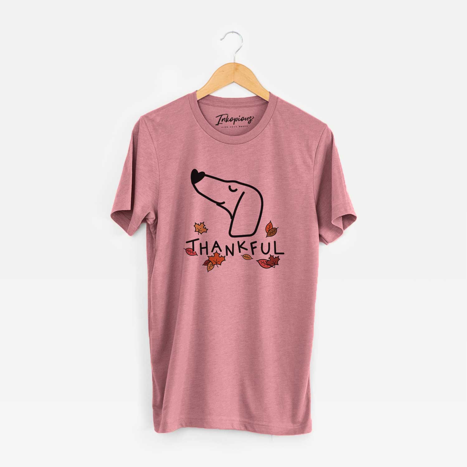 Minimalist line drawing of a Dachshund with 'Thankful' lettering on a Mauve Unisex crewneck