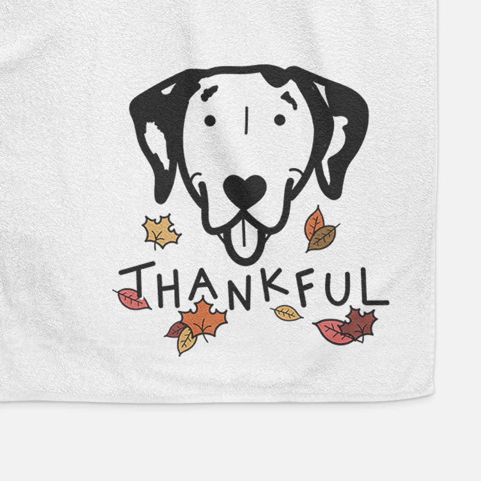 Minimalist line drawing of a Dalmatian with 'Thankful' lettering on a decorative hand towel