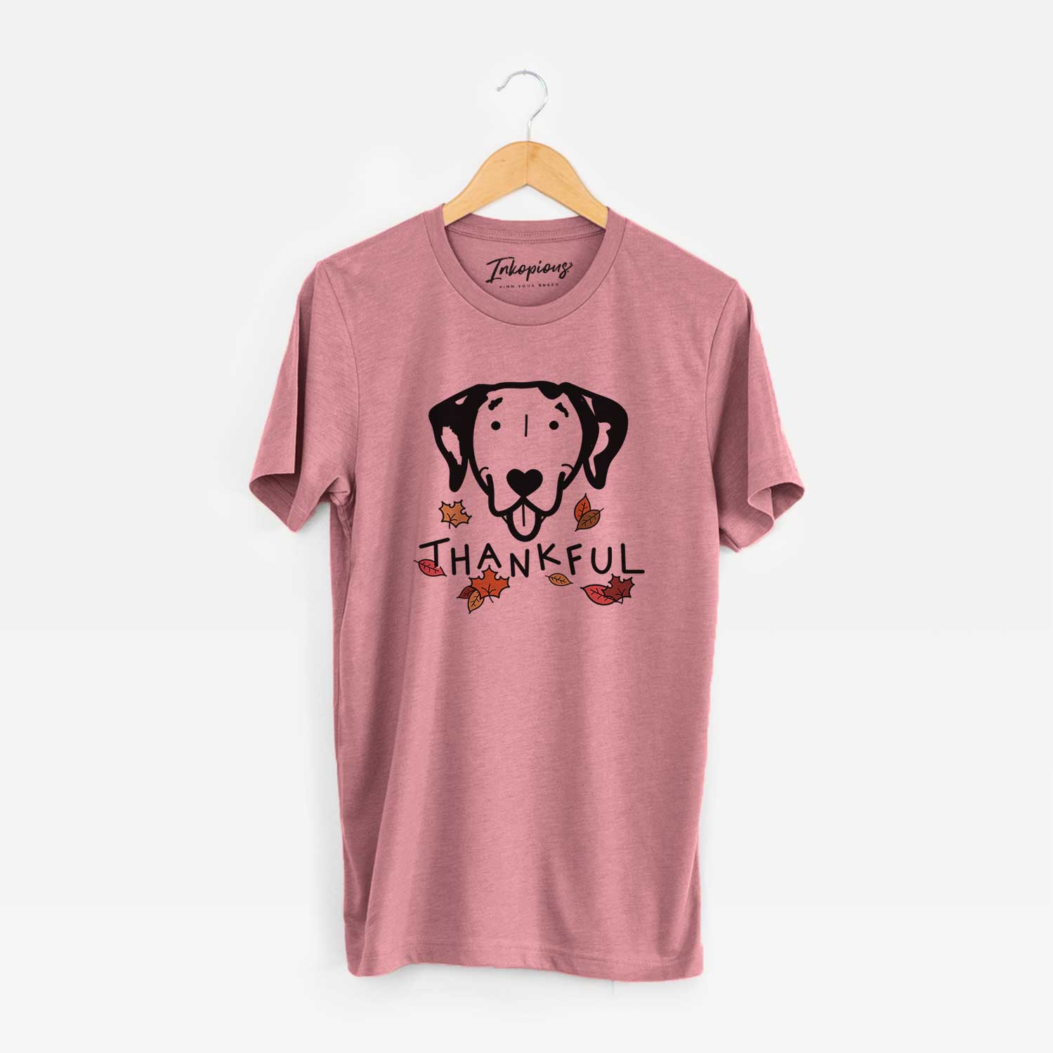 Minimalist line drawing of a Dalmatian with 'Thankful' lettering on a Mauve Unisex crewneck