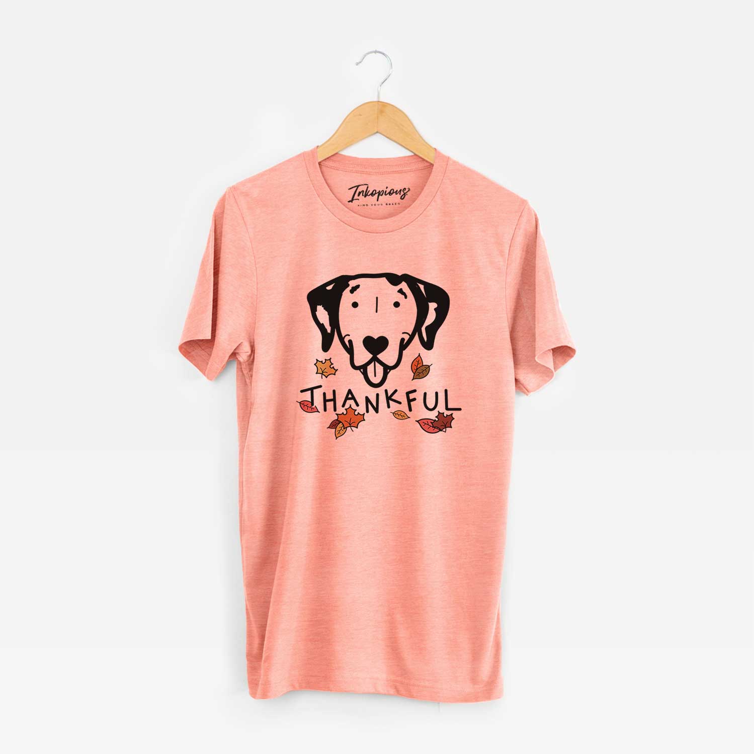 Minimalist line drawing of a Dalmatian with 'Thankful' lettering on a Sunset Unisex crewneck