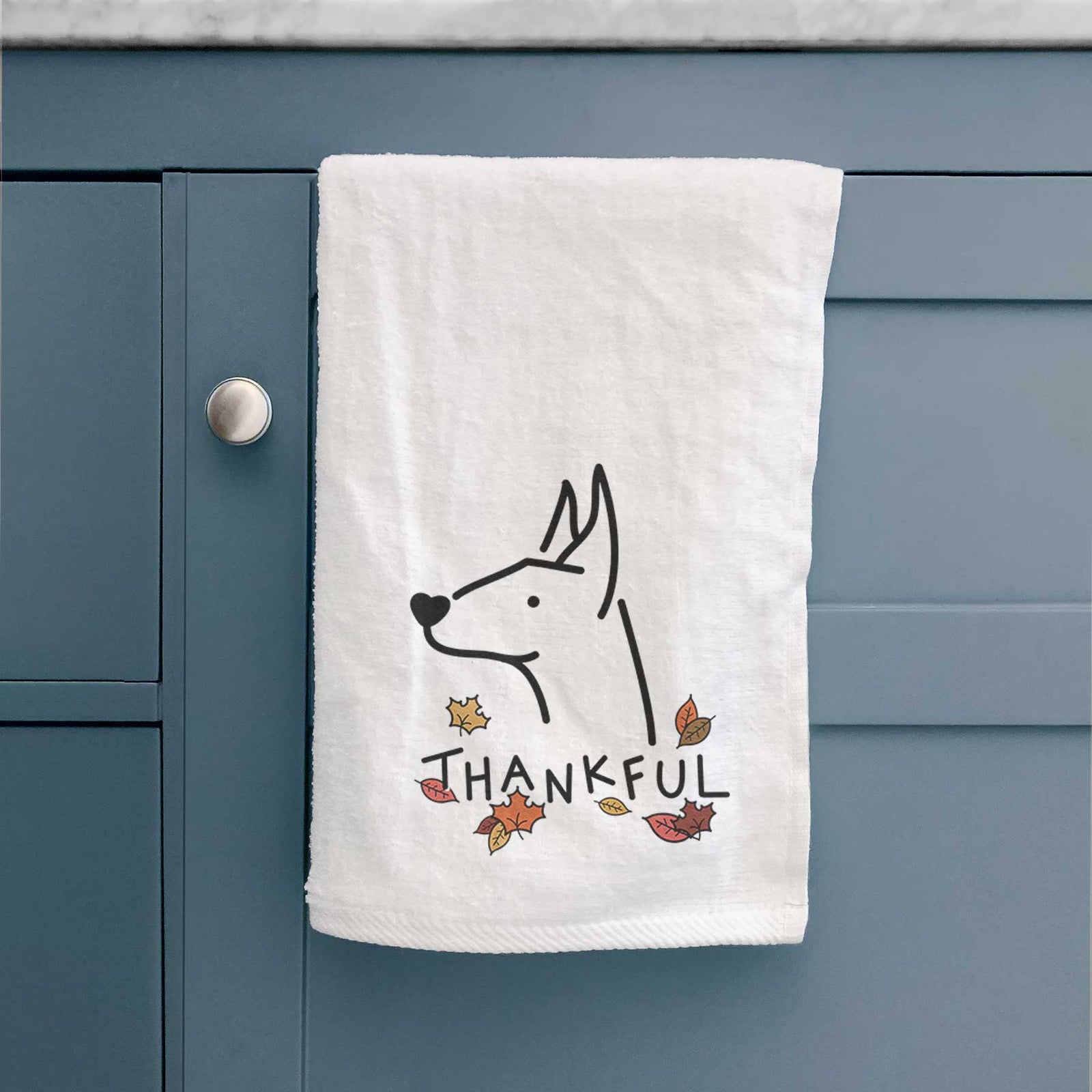 Minimalist line drawing of a Doberman Pinscher with 'Thankful' lettering on a decorative hand towel