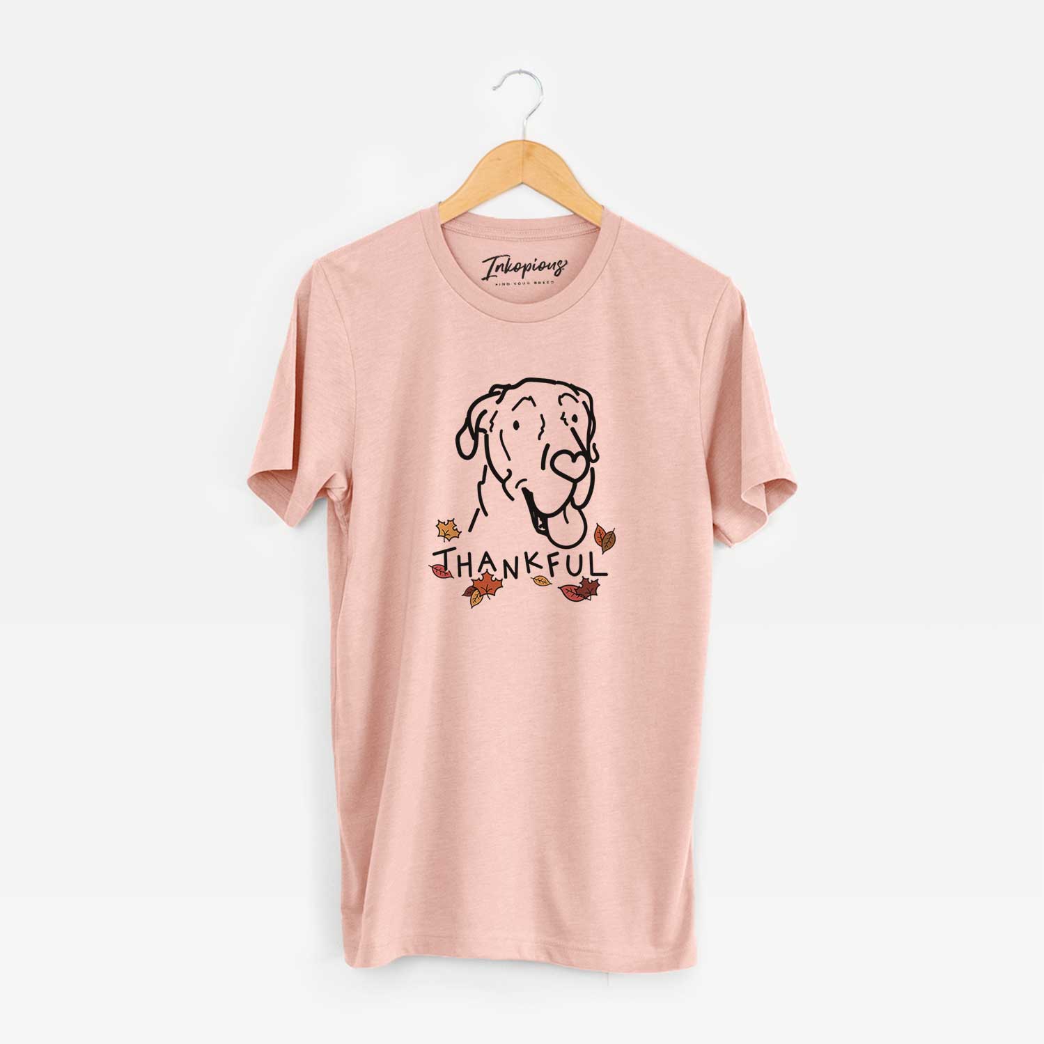 Minimalist line drawing of Duncan the Great Dane with 'Thankful' lettering on a Peach Unisex crewneck