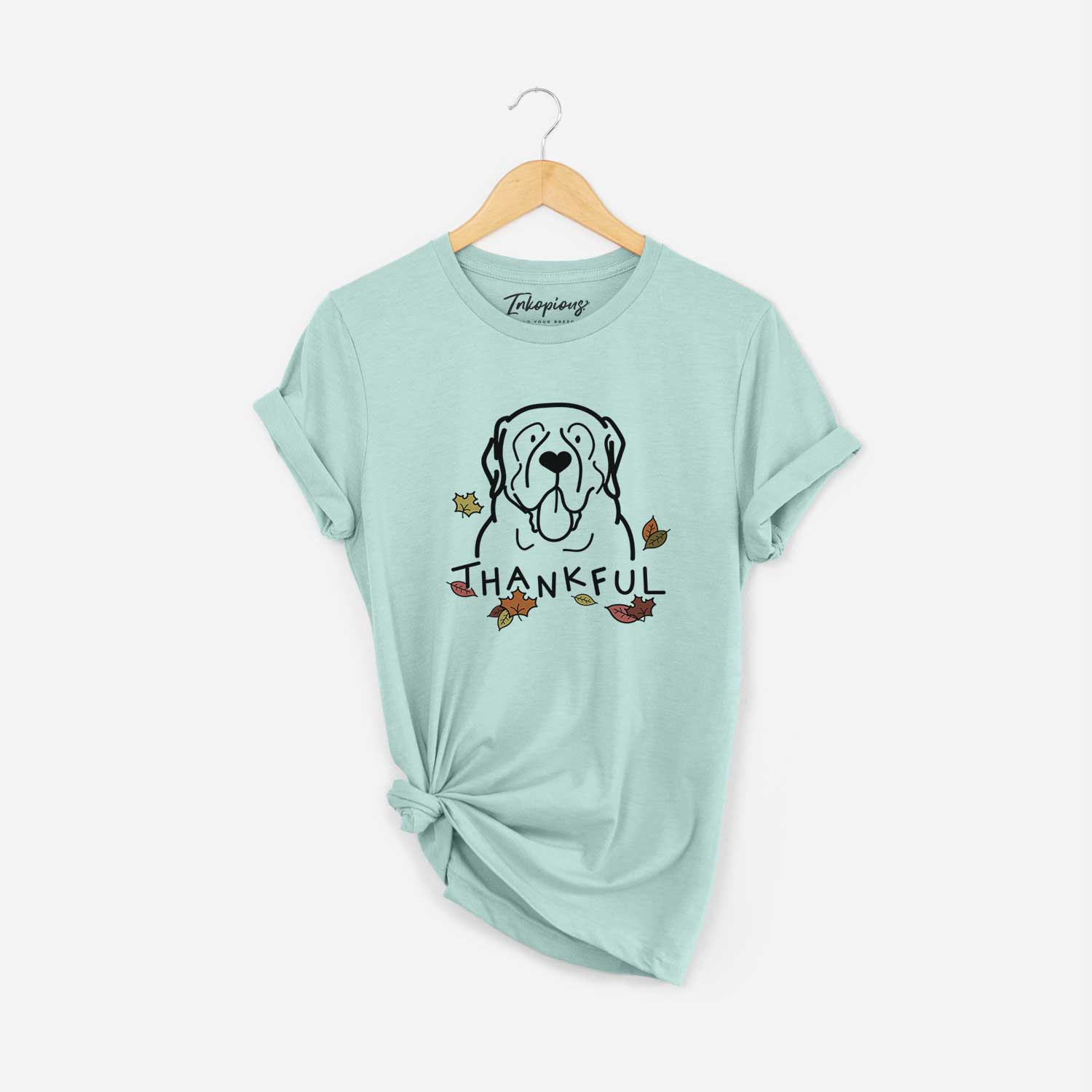 Minimalist line drawing of an English Mastiff with 'Thankful' lettering on a Heather Sage Unisex crewneck