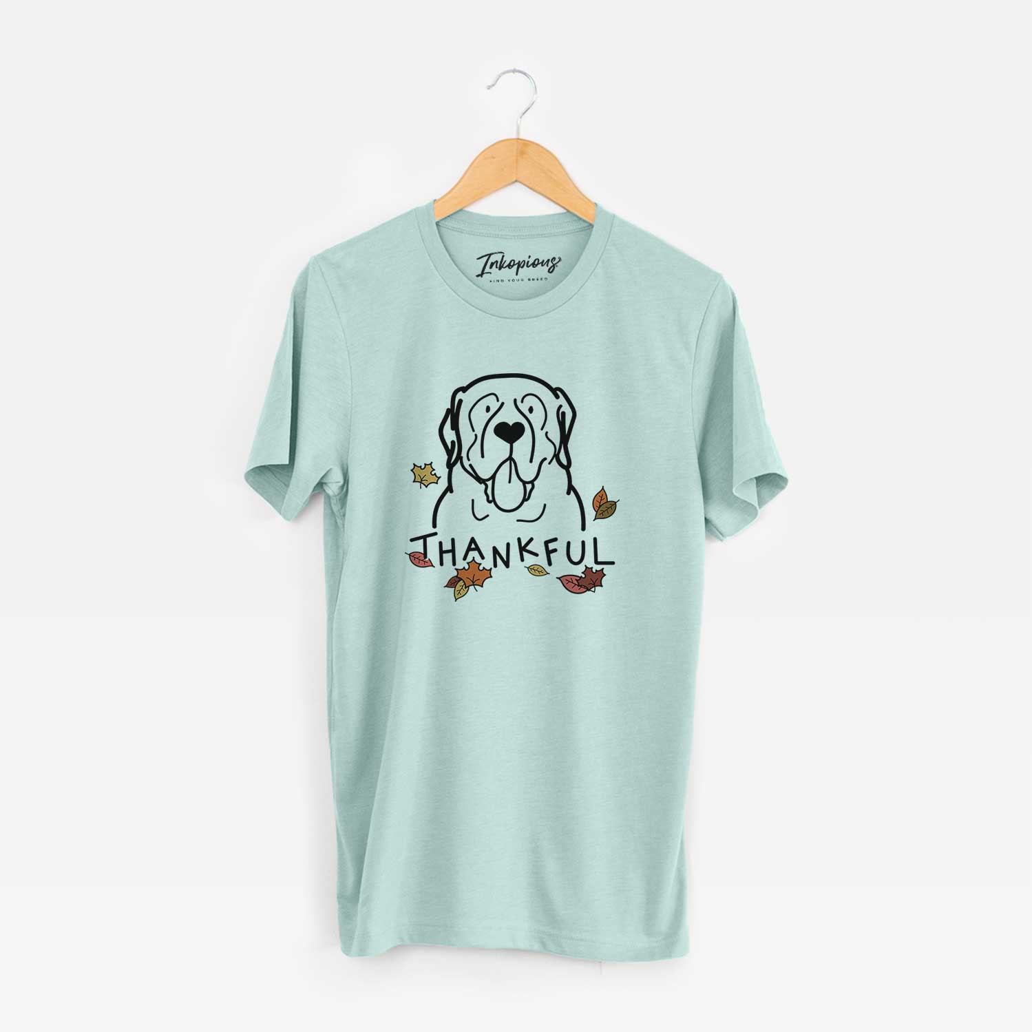 Minimalist line drawing of an English Mastiff with 'Thankful' lettering on a Heather Sage Unisex crewneck