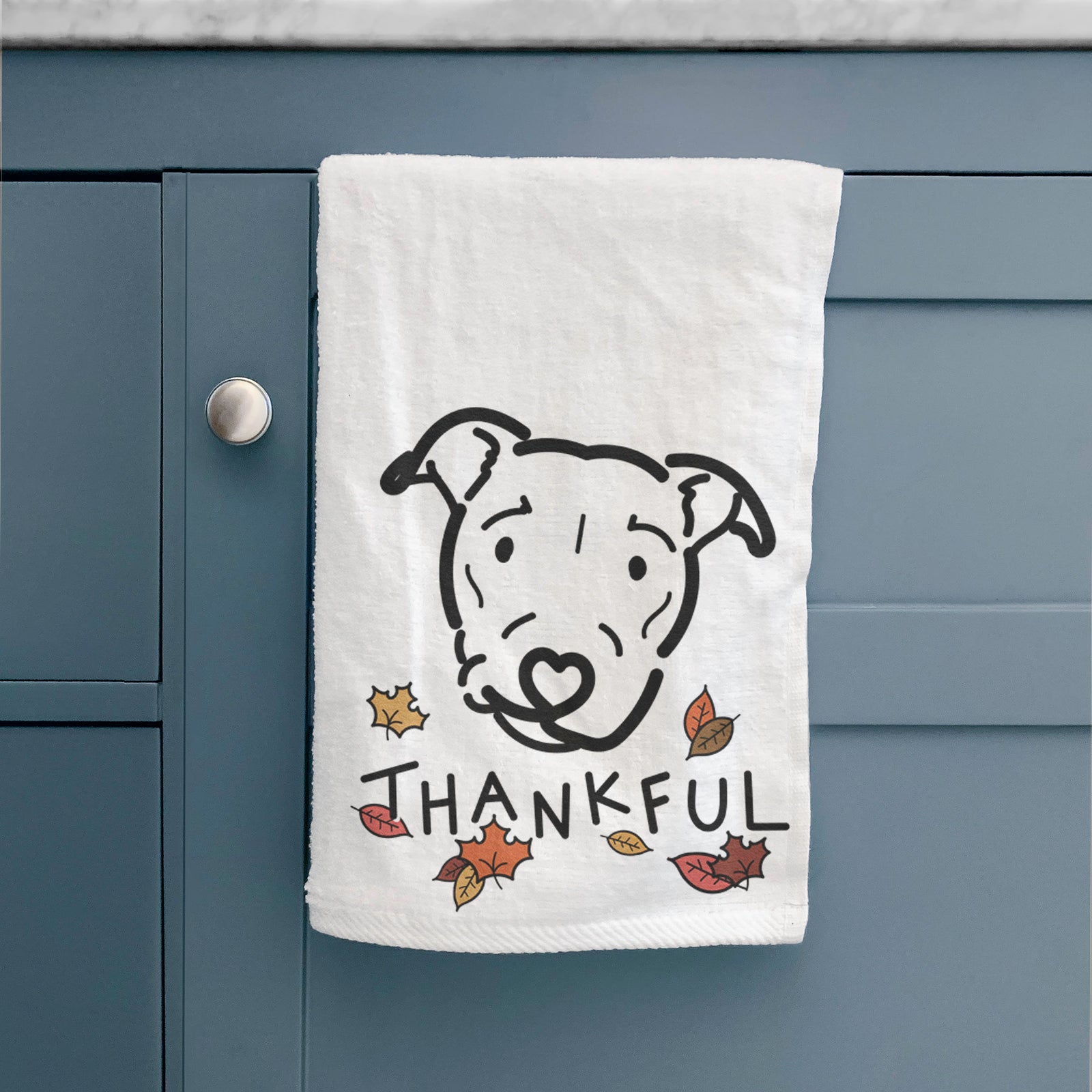 Minimalist line drawing of Ernie the Pitbull Mix with 'Thankful' lettering on a decorative hand towel