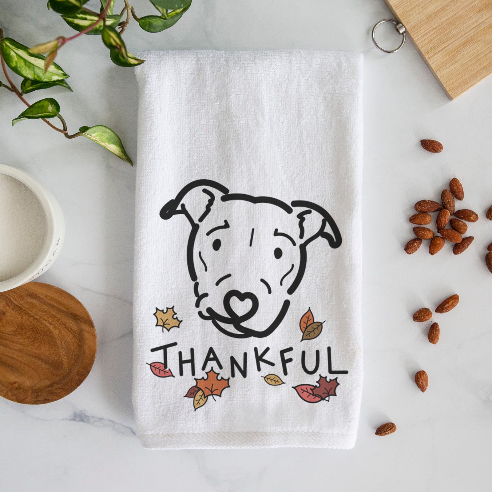 Minimalist line drawing of Ernie the Pitbull Mix with 'Thankful' lettering on a decorative hand towel