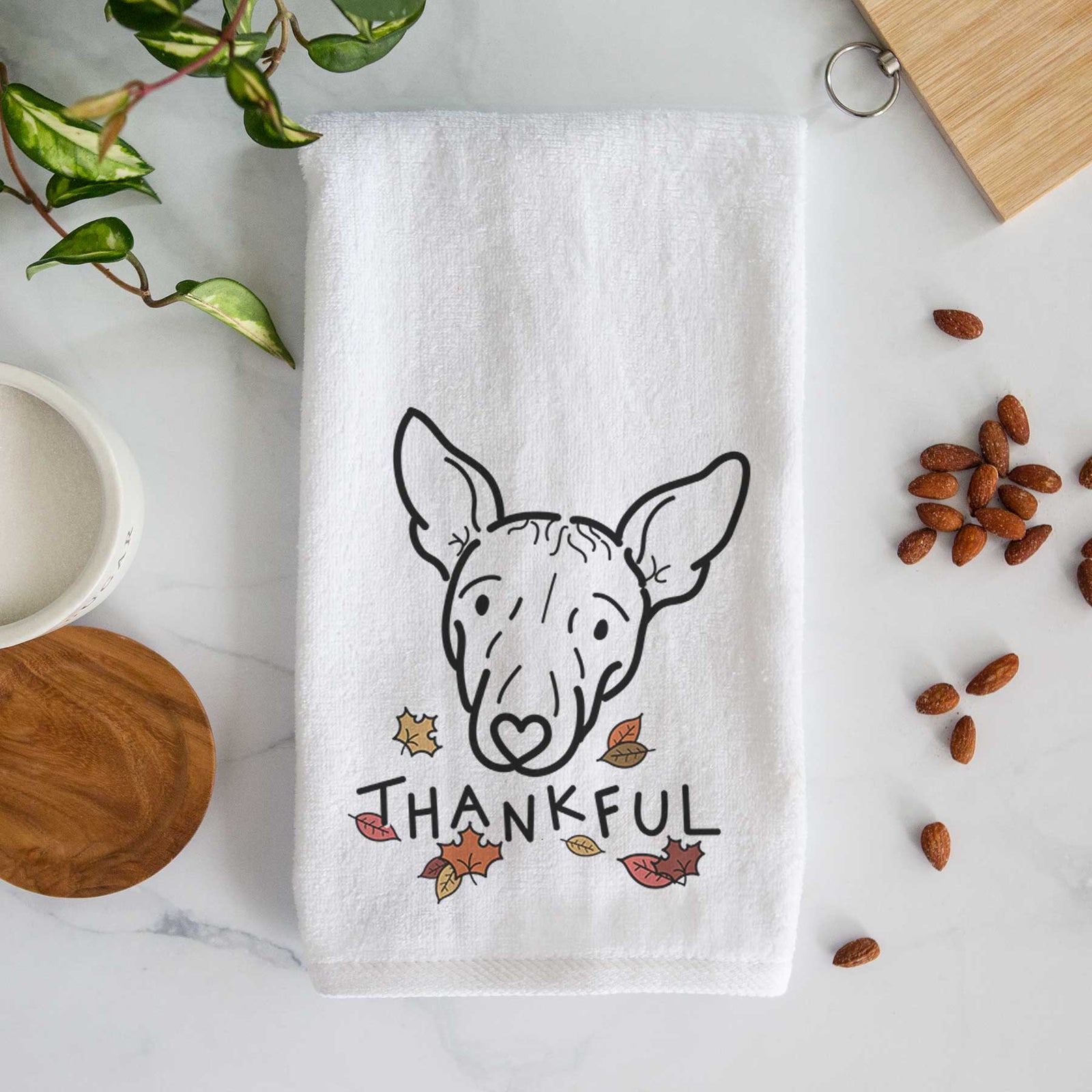 Minimalist line drawing of Georgia the American Hairless Terrier with 'Thankful' lettering on a decorative hand towel