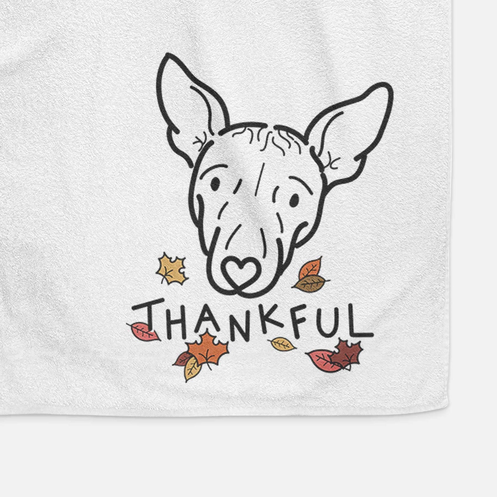 Minimalist line drawing of Georgia the American Hairless Terrier with 'Thankful' lettering on a decorative hand towel