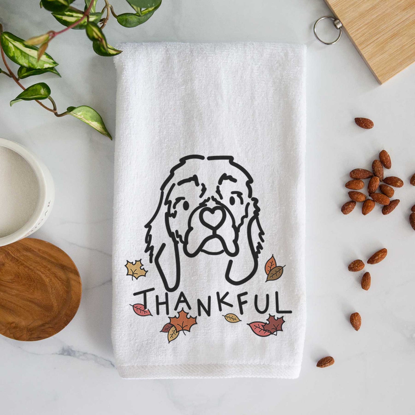 Minimalist line drawing of GiGi the Cocker Spaniel with 'Thankful' lettering on a decorative hand towel