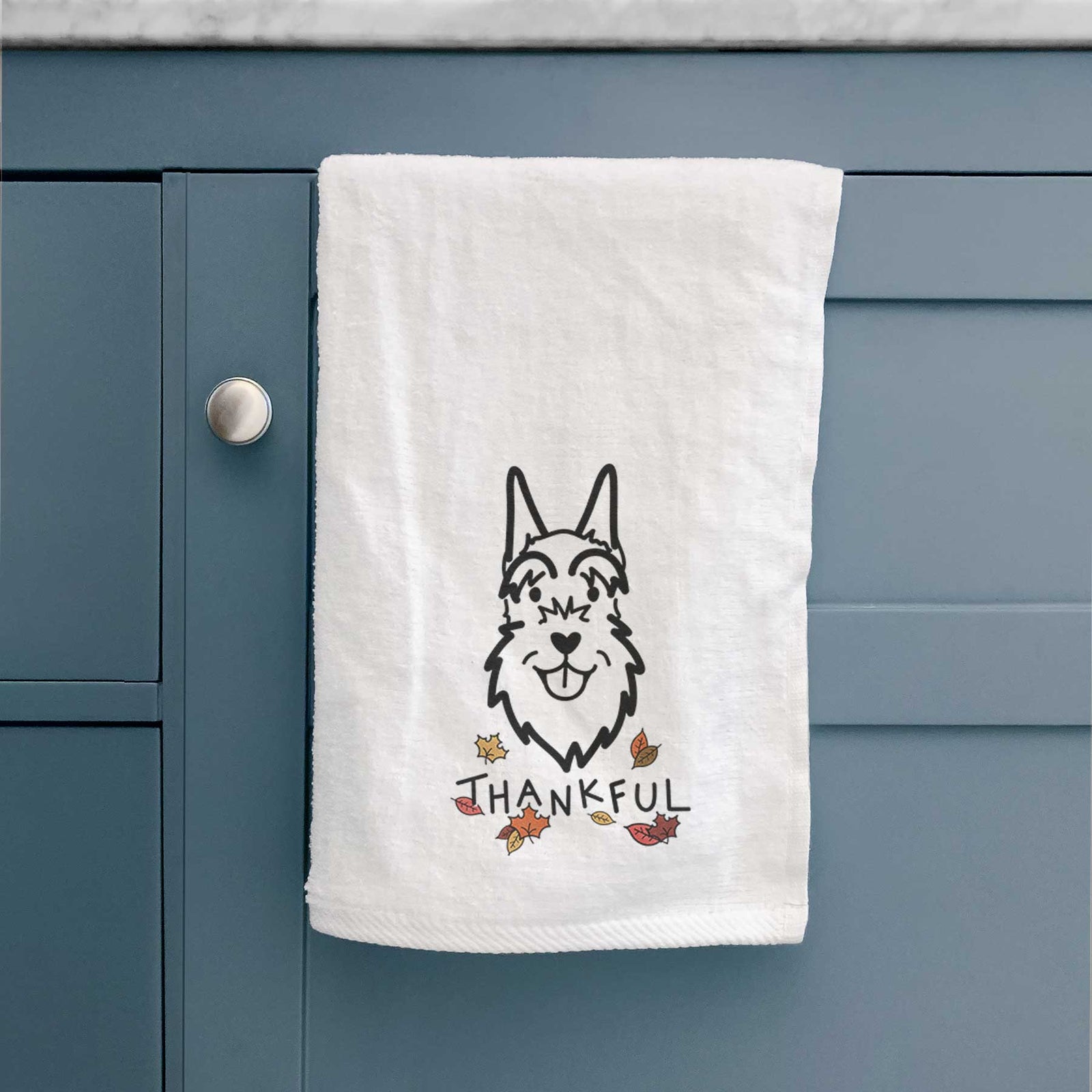 Minimalist line drawing of a Schnauzer Cropped Ears with 'Thankful' lettering on a decorative hand towel