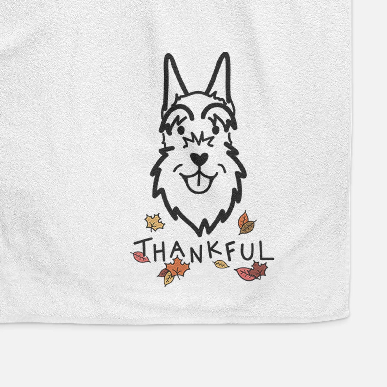 Minimalist line drawing of a Schnauzer Cropped Ears with 'Thankful' lettering on a decorative hand towel