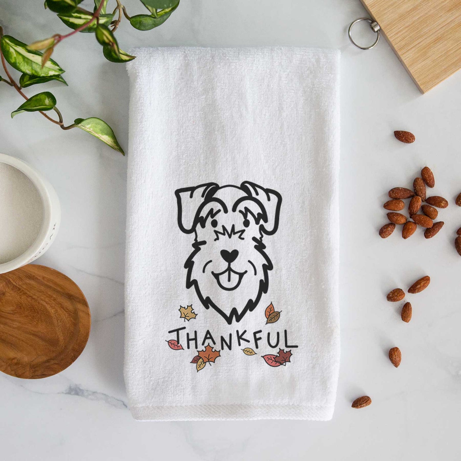 Minimalist line drawing of a Schnauzer Natural Ears with 'Thankful' lettering on a decorative hand towel