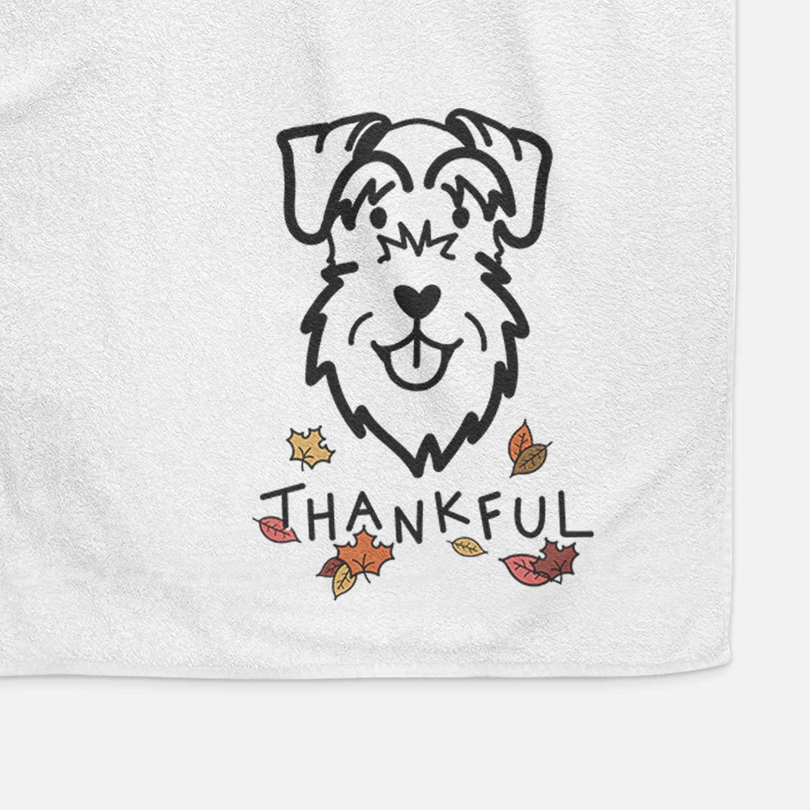 Minimalist line drawing of a Schnauzer Natural Ears with 'Thankful' lettering on a decorative hand towel
