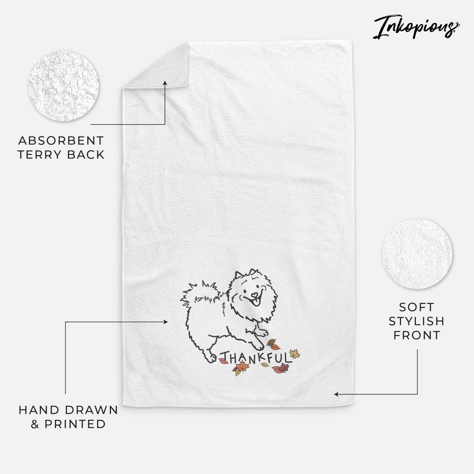 Minimalist line drawing of Goldie the Pomeranian Mix with 'Thankful' lettering on a decorative hand towel