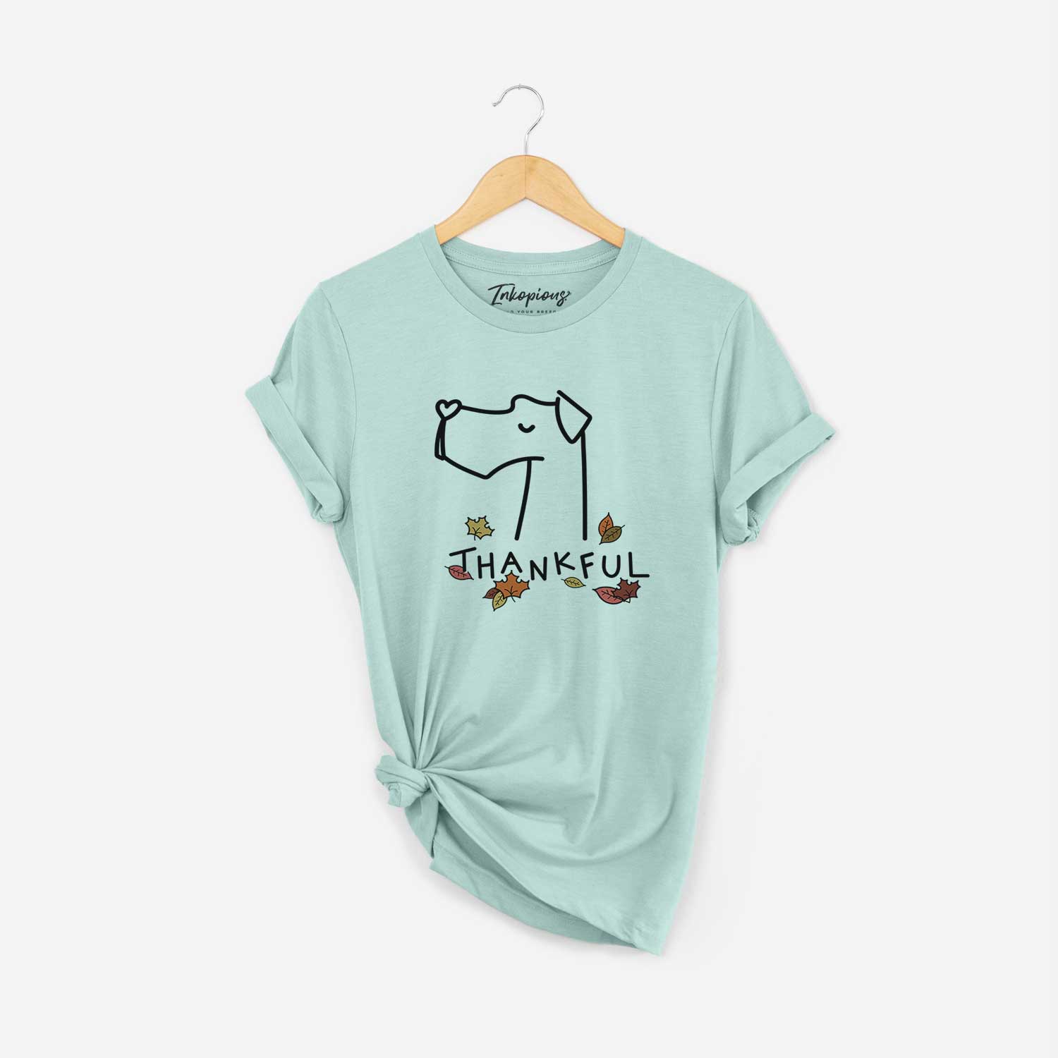 Minimalist line drawing of a Great Dane with 'Thankful' lettering on a Heather Sage Unisex crewneck