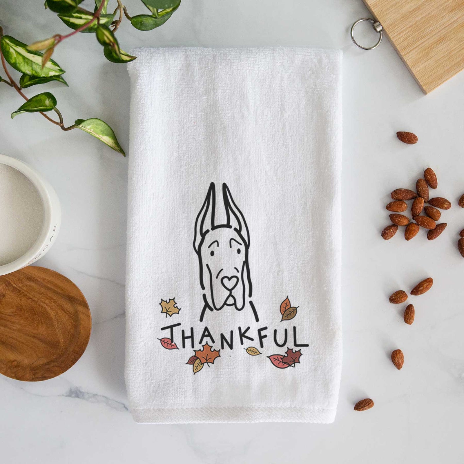 Minimalist line drawing of a Great Dane with Cropped Ears with 'Thankful' lettering on a decorative hand towel