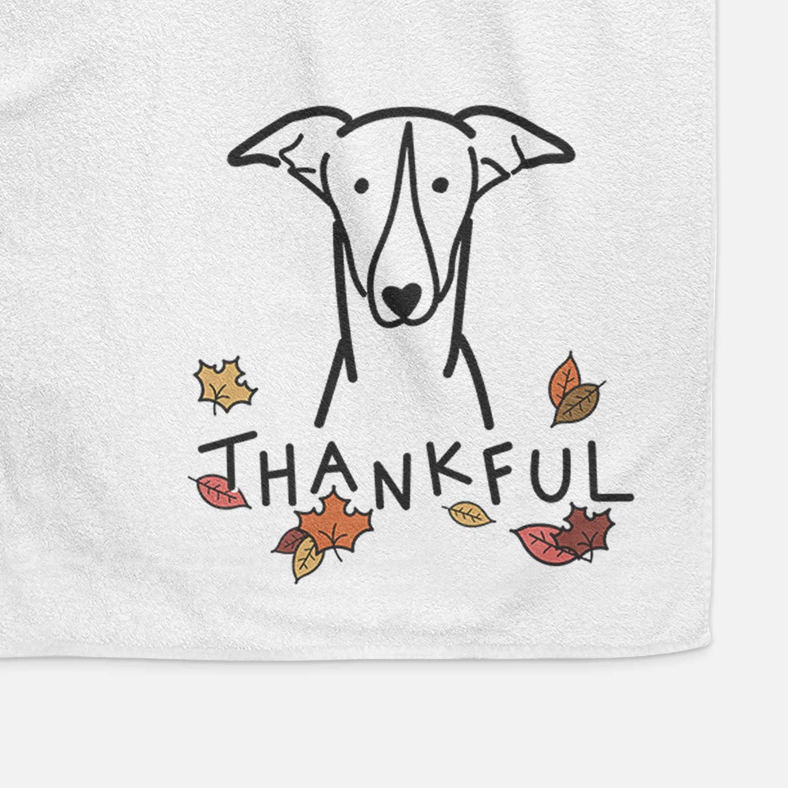 Minimalist line drawing of a Greyhound with 'Thankful' lettering on a decorative hand towel