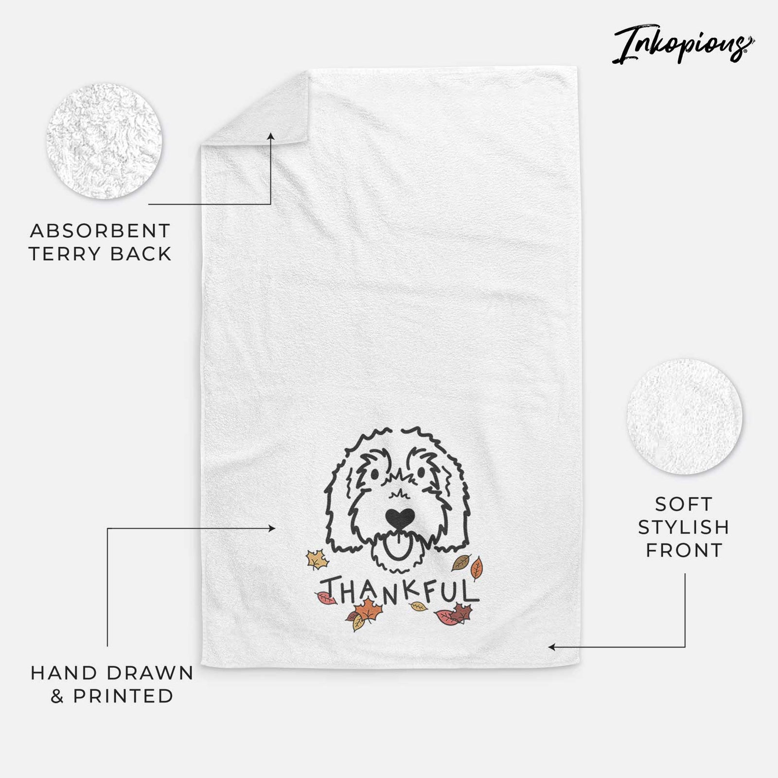 Minimalist line drawing of Gus the Goldendoodle with 'Thankful' lettering on a decorative hand towel
