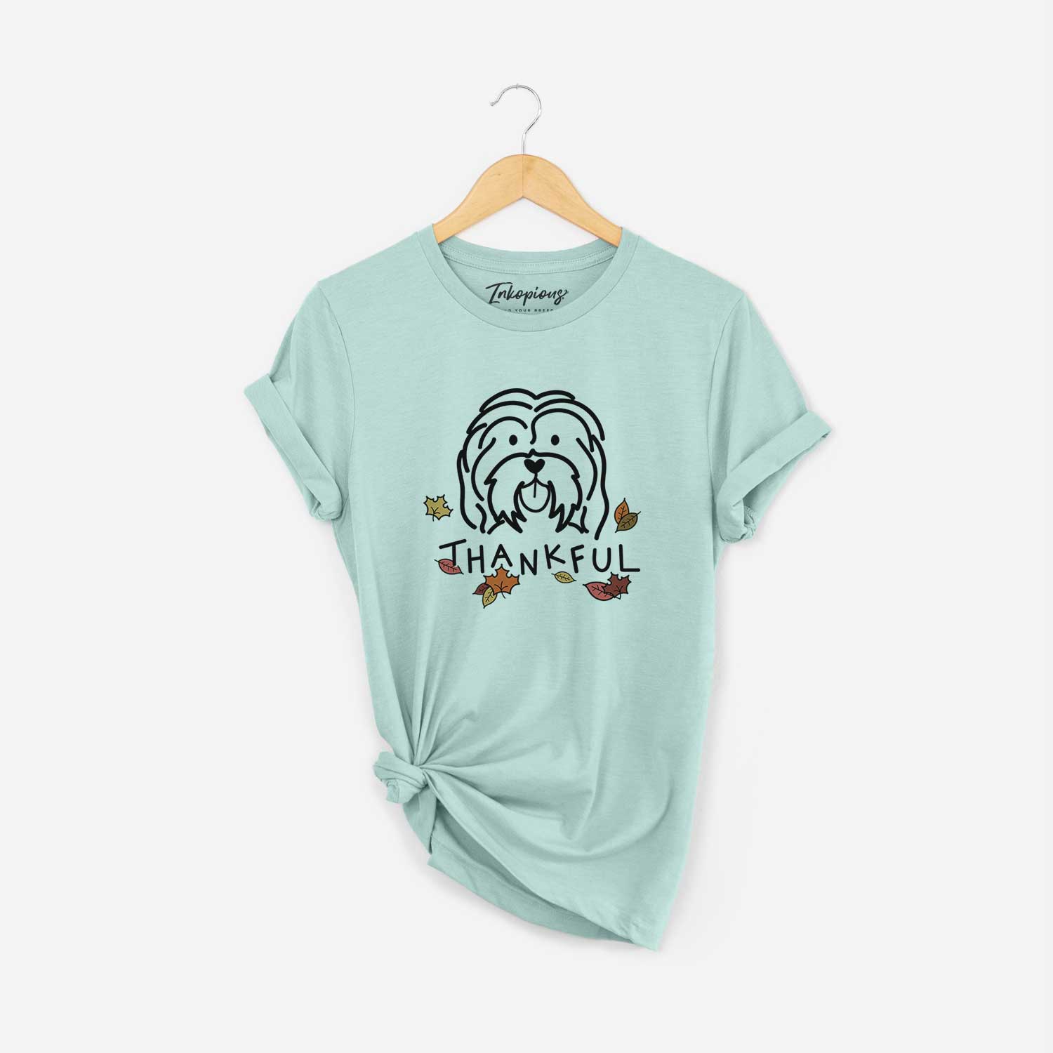 Minimalist line drawing of a Havanese with 'Thankful' lettering on a Heather Sage Unisex crewneck