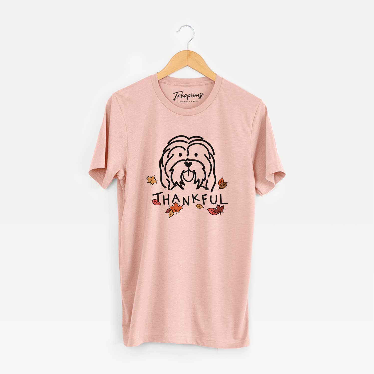 Minimalist line drawing of a Havanese with 'Thankful' lettering on a Peach Unisex crewneck
