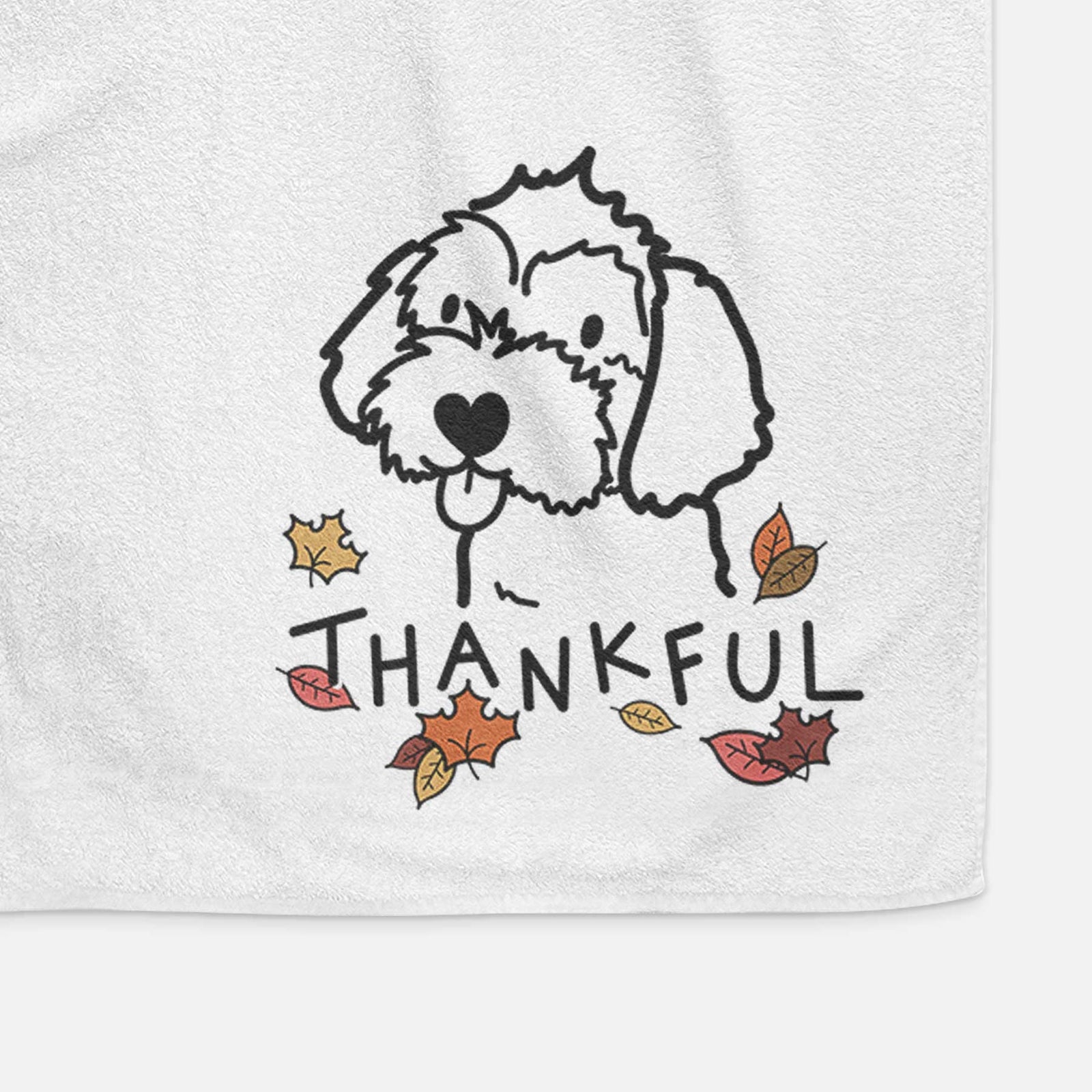 Minimalist line drawing of a Havapoo with 'Thankful' lettering on a decorative hand towel