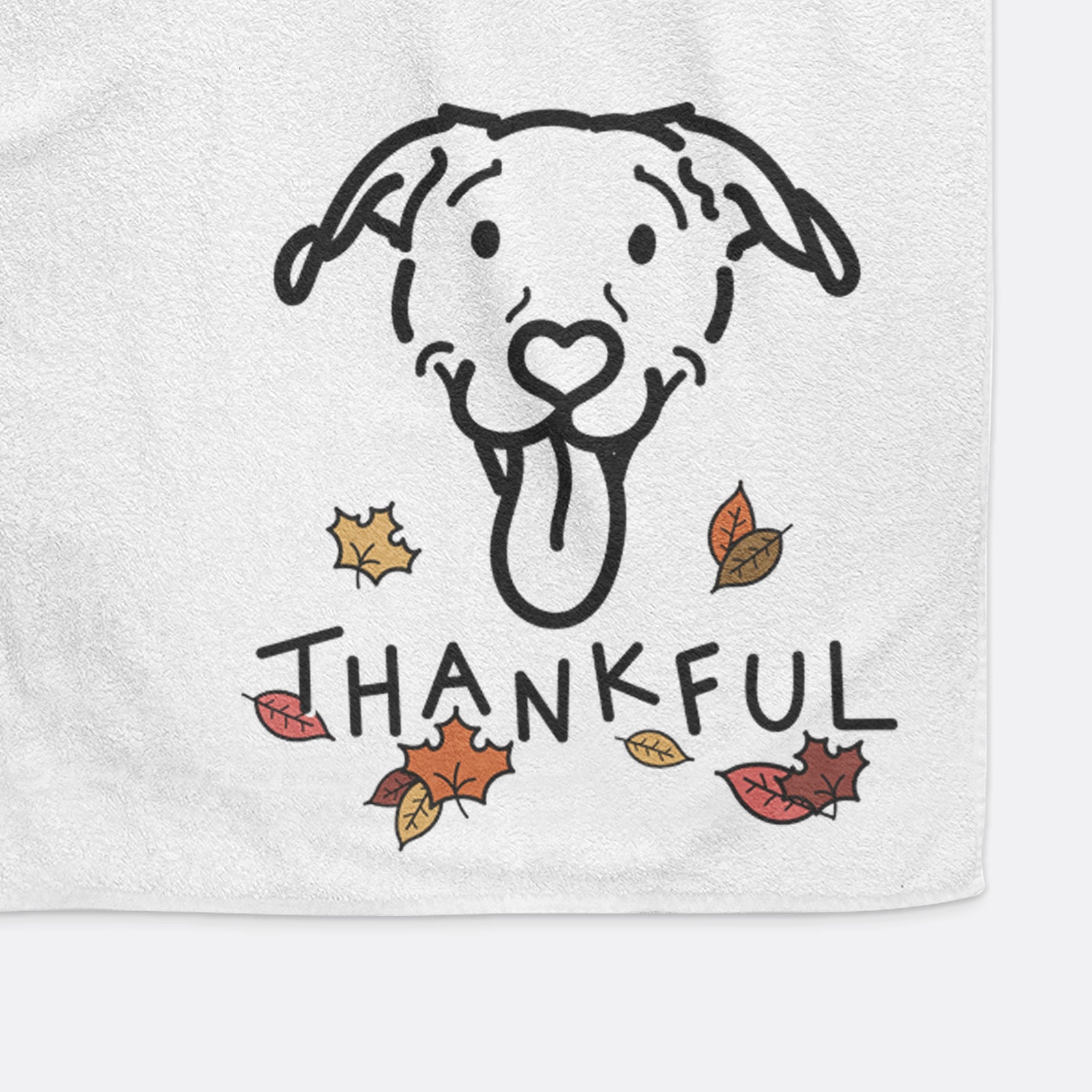 Minimalist line drawing of Hemi the Pitbull Mix with 'Thankful' lettering on a decorative hand towel