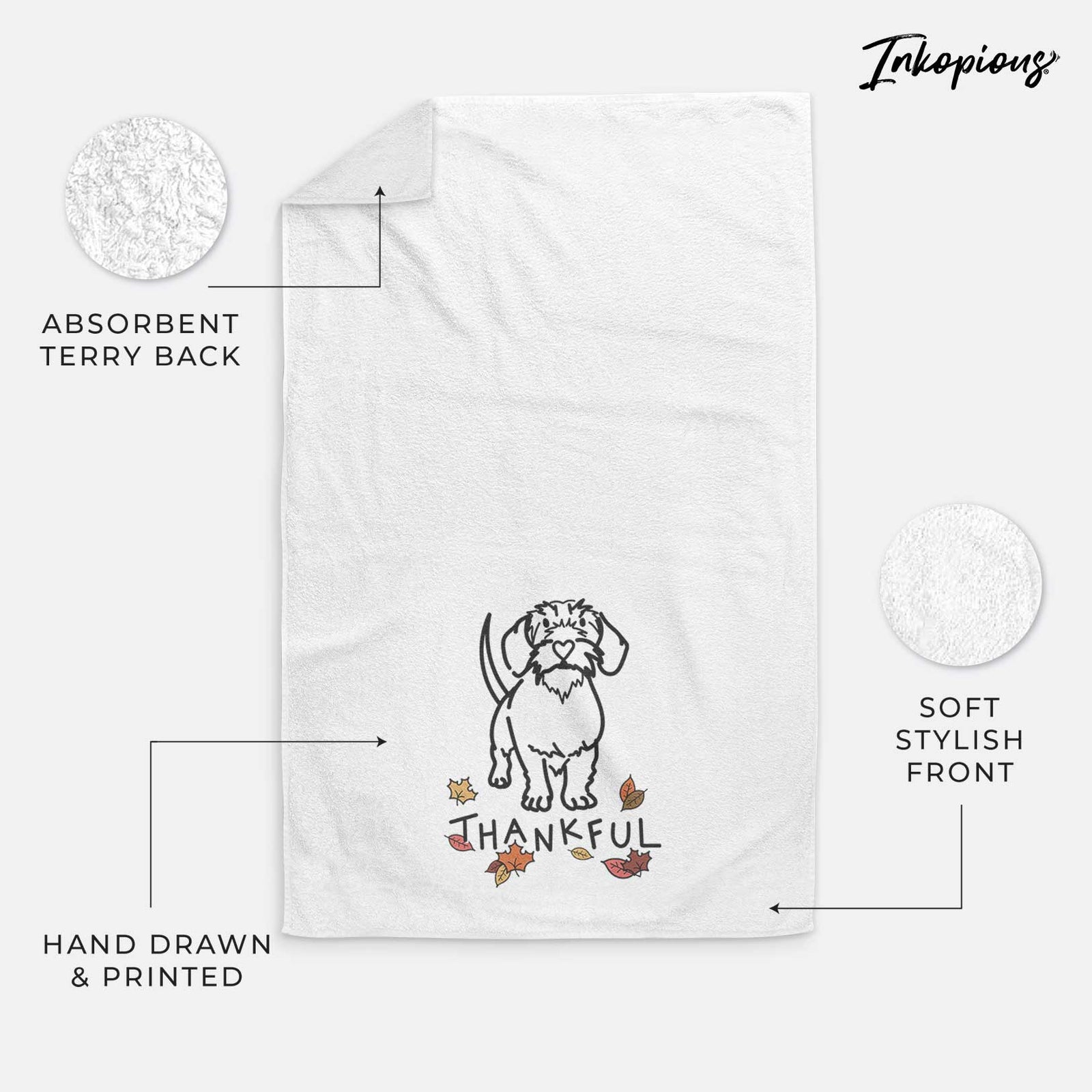 Minimalist line drawing of Henry the Wire Dachshund with 'Thankful' lettering on a decorative hand towel