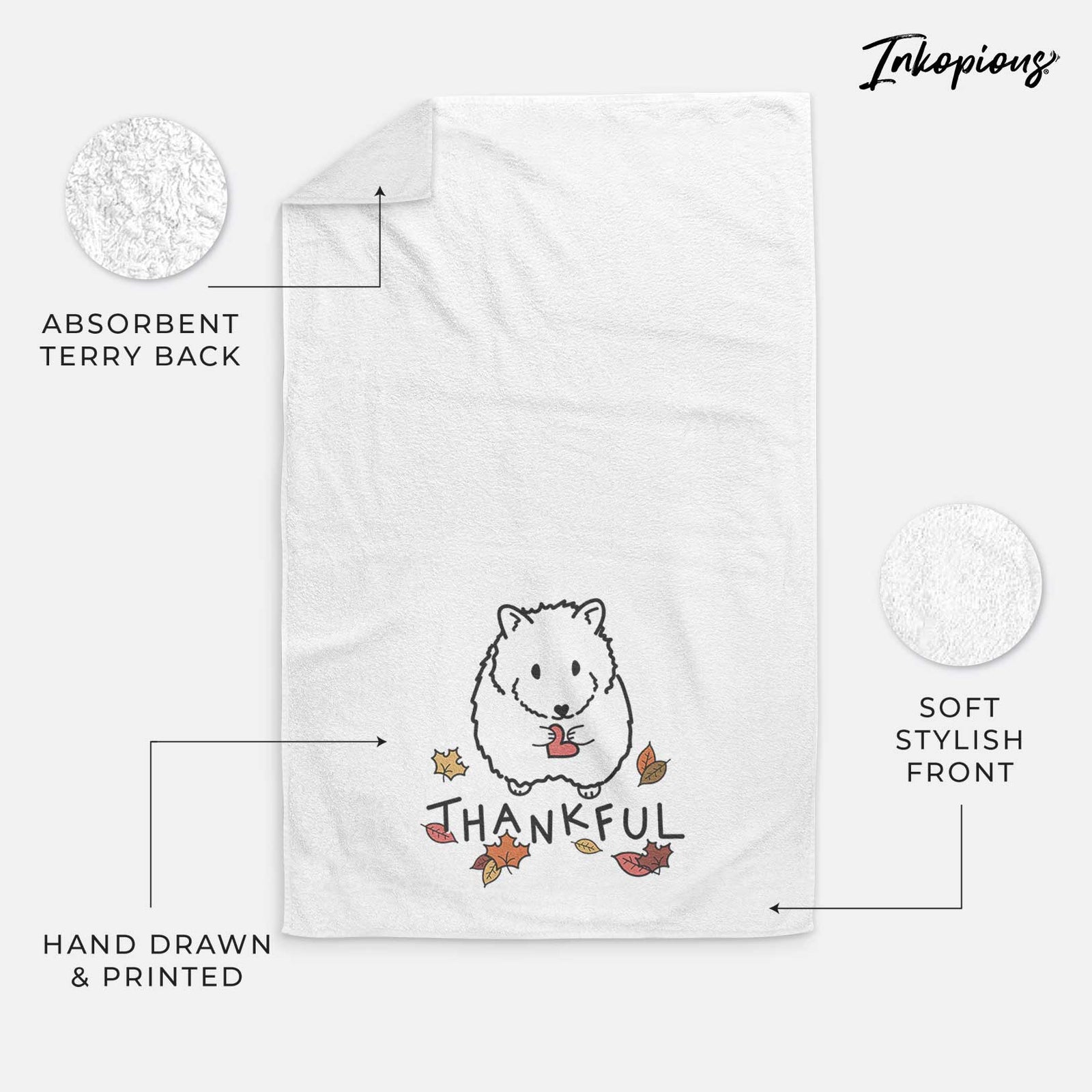 Minimalist line drawing of Hilga the Hamster with 'Thankful' lettering on a decorative hand towel