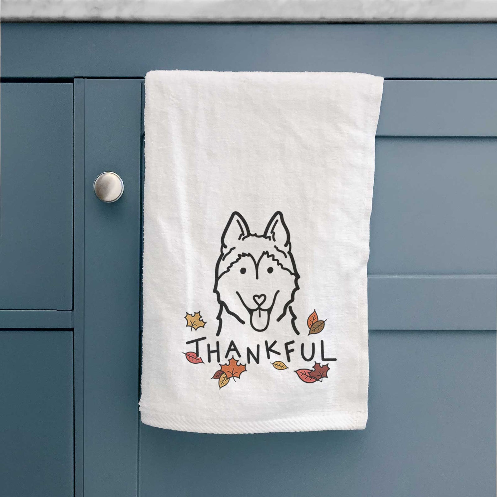 Minimalist line drawing of a Siberian Husky with 'Thankful' lettering on a decorative hand towel