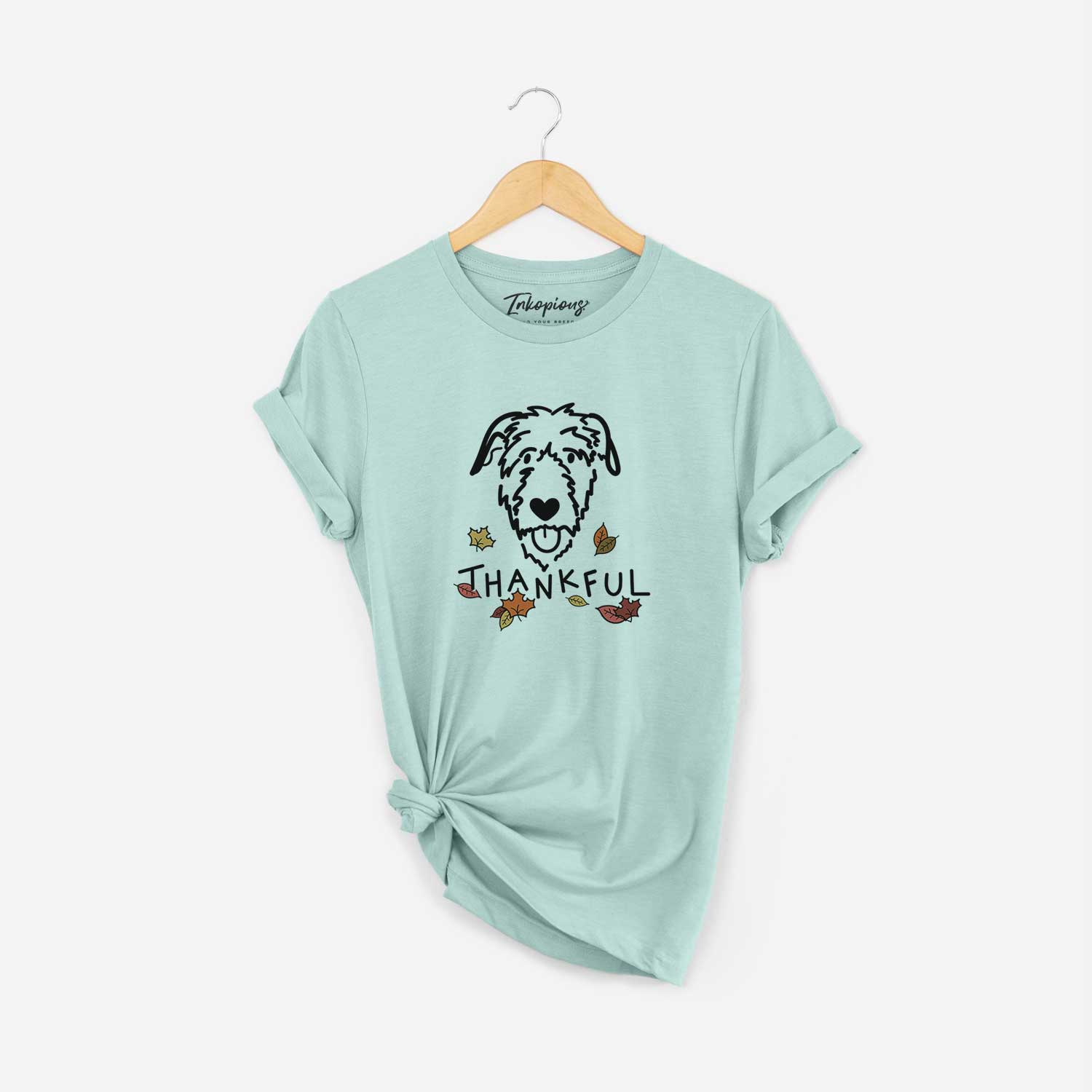 Minimalist line drawing of an Irish Wolfhound with 'Thankful' lettering on a Heather Sage Unisex crewneck