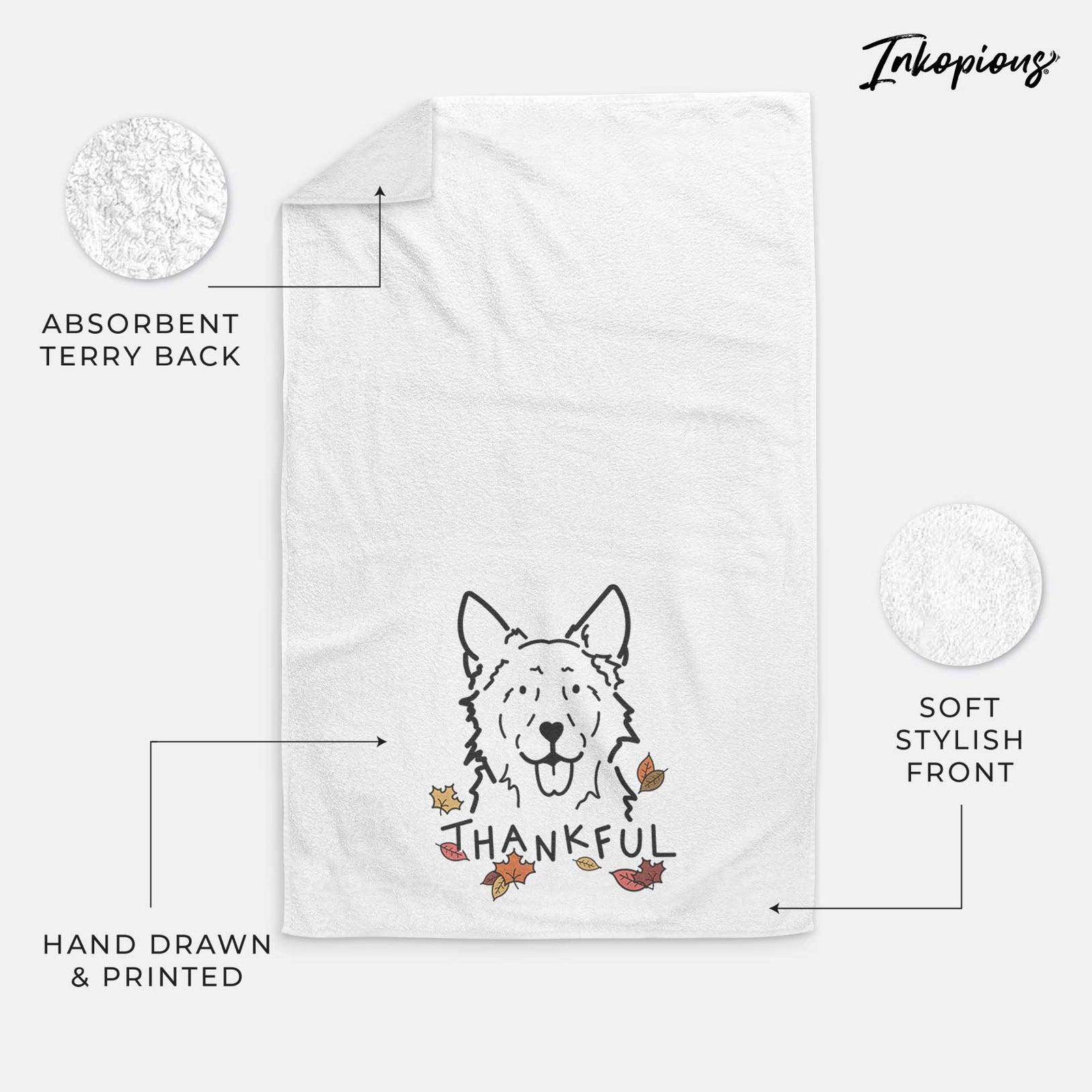Minimalist line drawing of Jack the Mudi with 'Thankful' lettering on a decorative hand towel