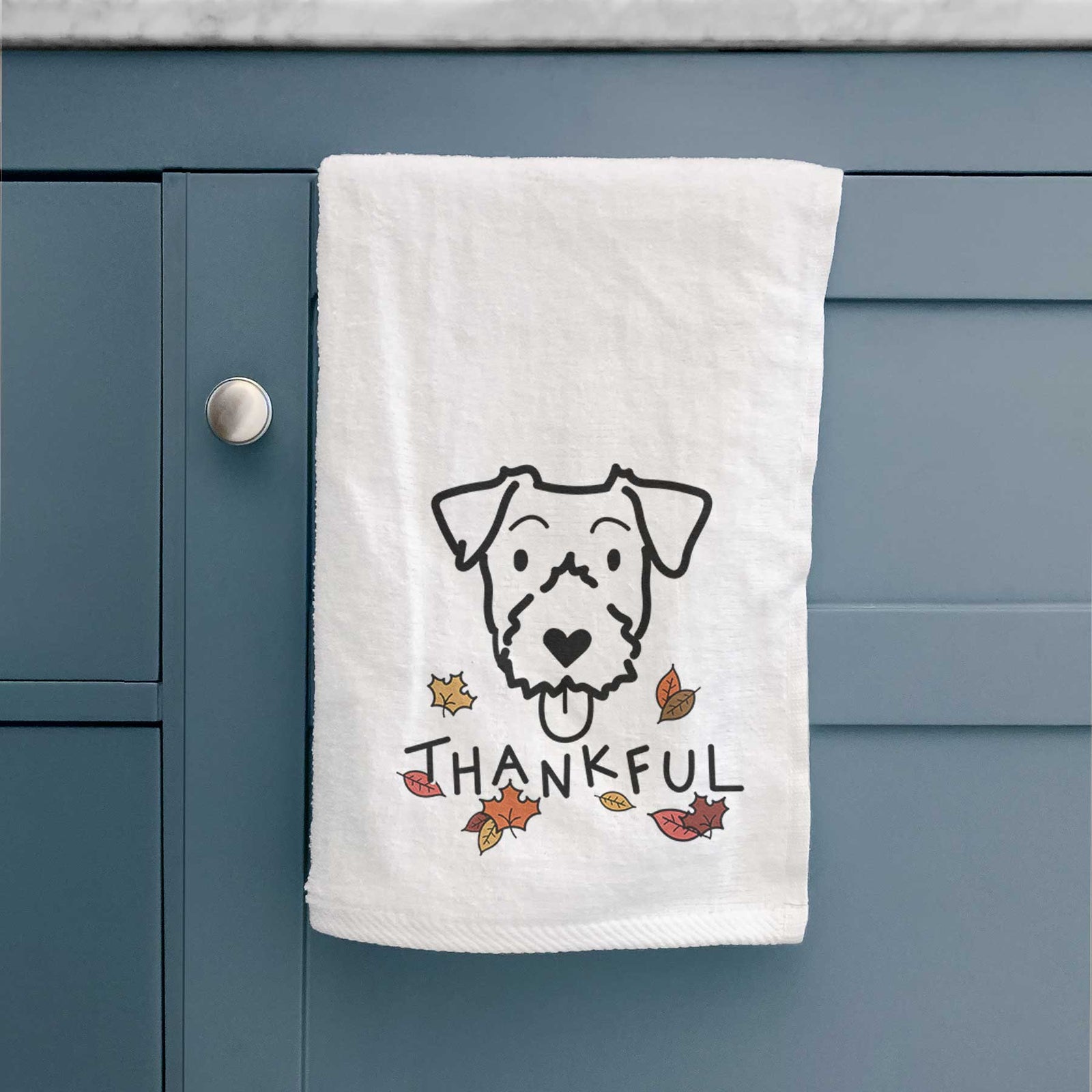 Minimalist line drawing of a Jack Russell Terrier with 'Thankful' lettering on a decorative hand towel