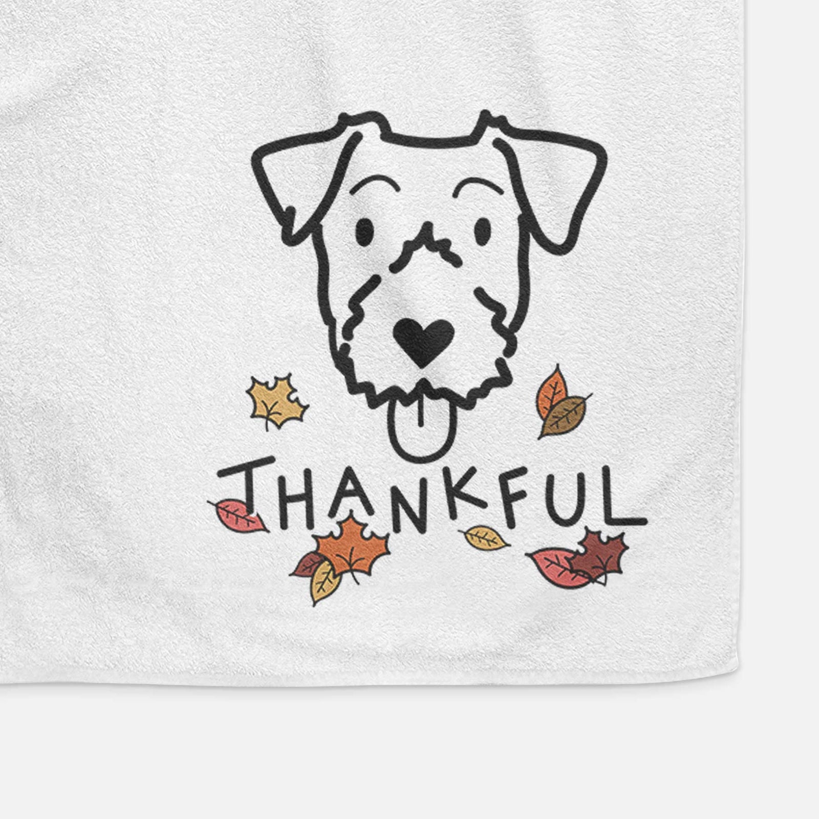 Minimalist line drawing of a Jack Russell Terrier with 'Thankful' lettering on a decorative hand towel