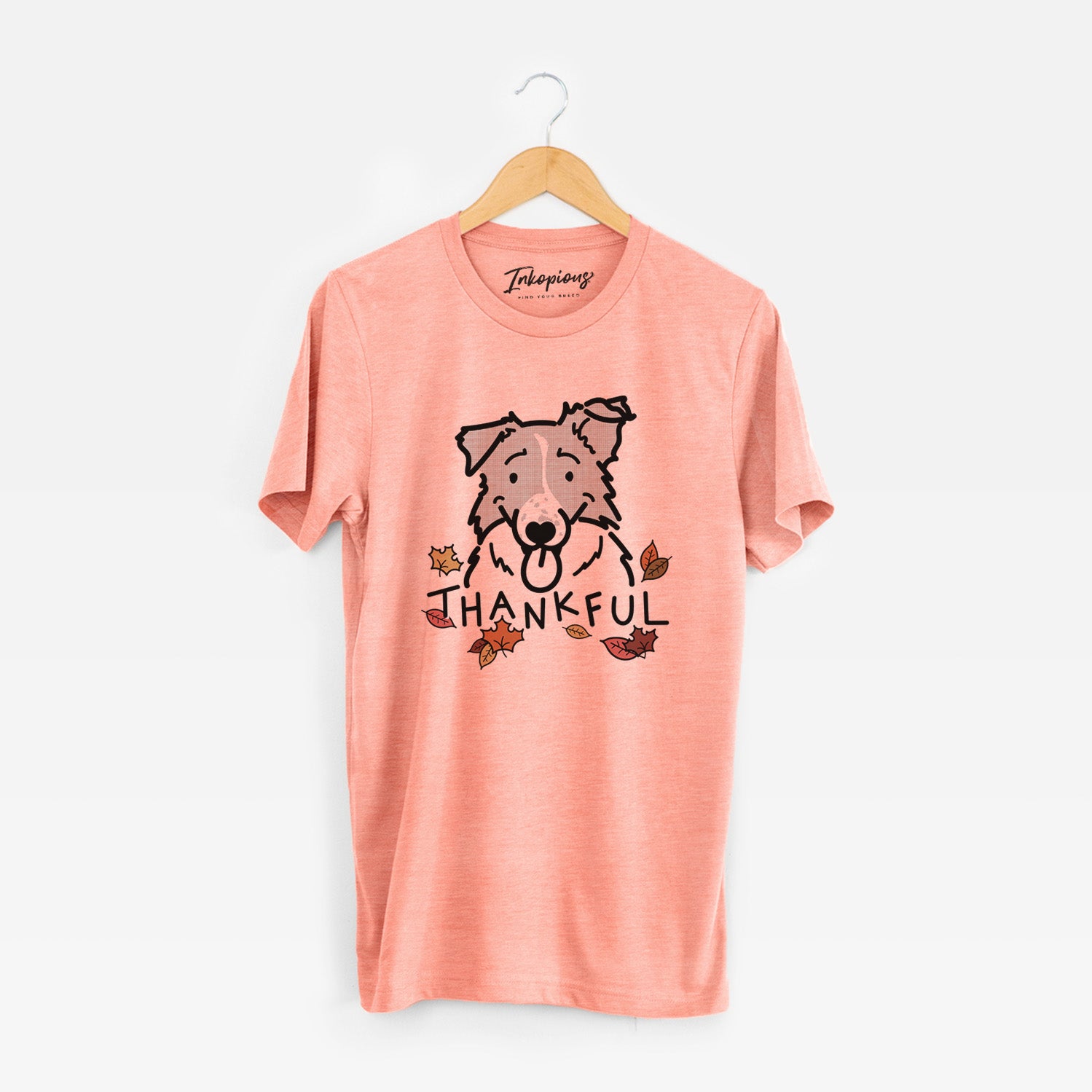 Minimalist line drawing of Jam the Border Collie with 'Thankful' lettering on a Sunset Unisex crewneck