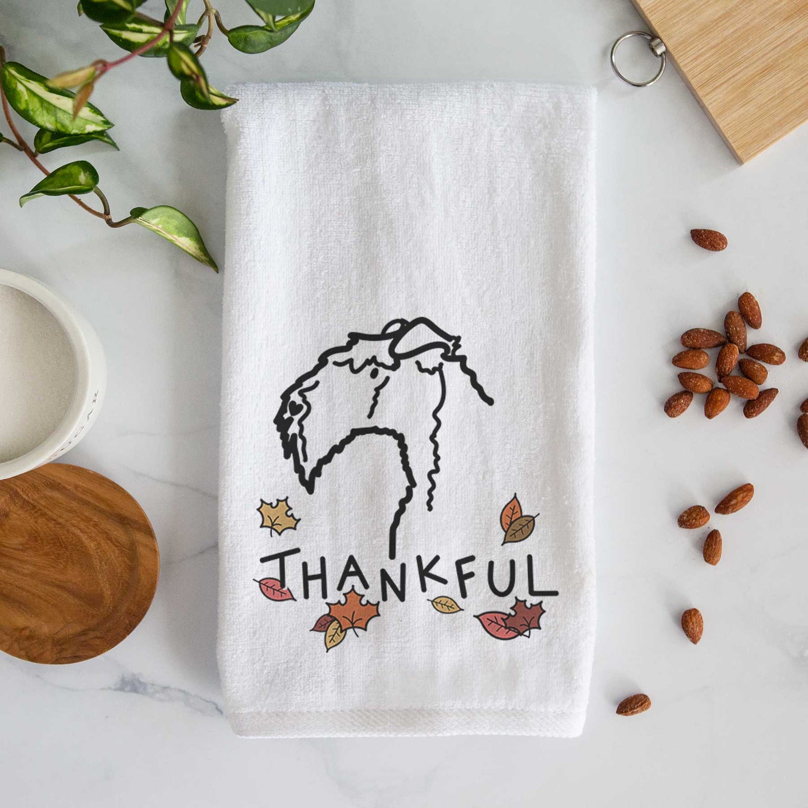Minimalist line drawing of a Kerry Blue Terrier with 'Thankful' lettering on a decorative hand towel