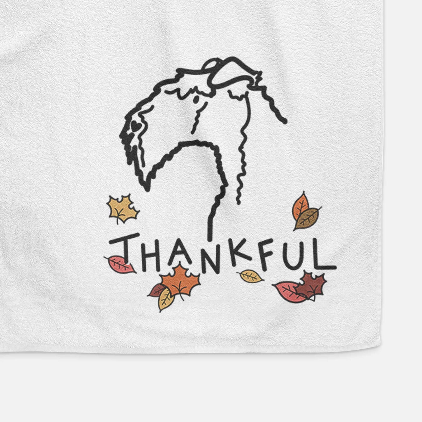 Minimalist line drawing of a Kerry Blue Terrier with 'Thankful' lettering on a decorative hand towel