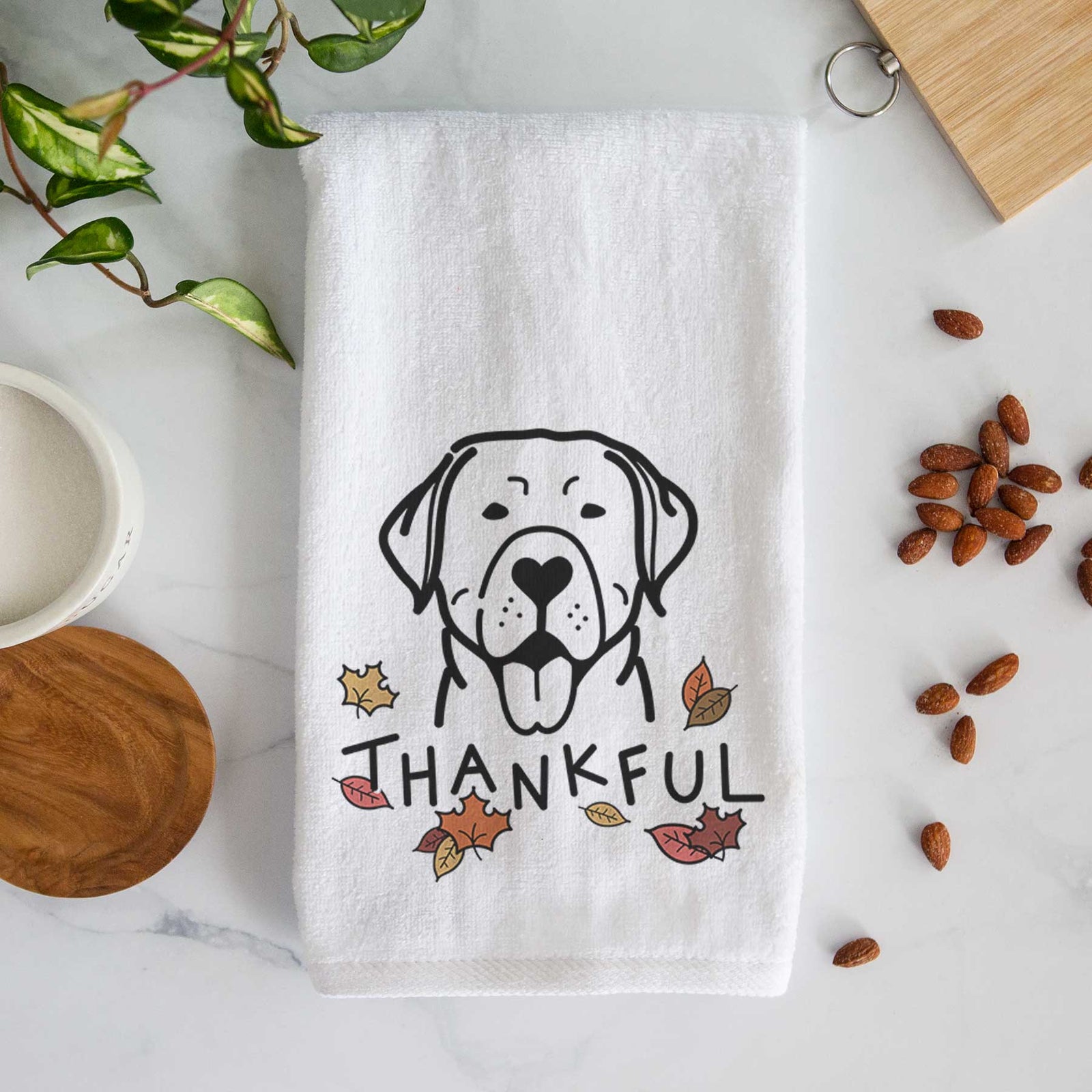 Minimalist line drawing of a Labrador Retriever with 'Thankful' lettering on a decorative hand towel