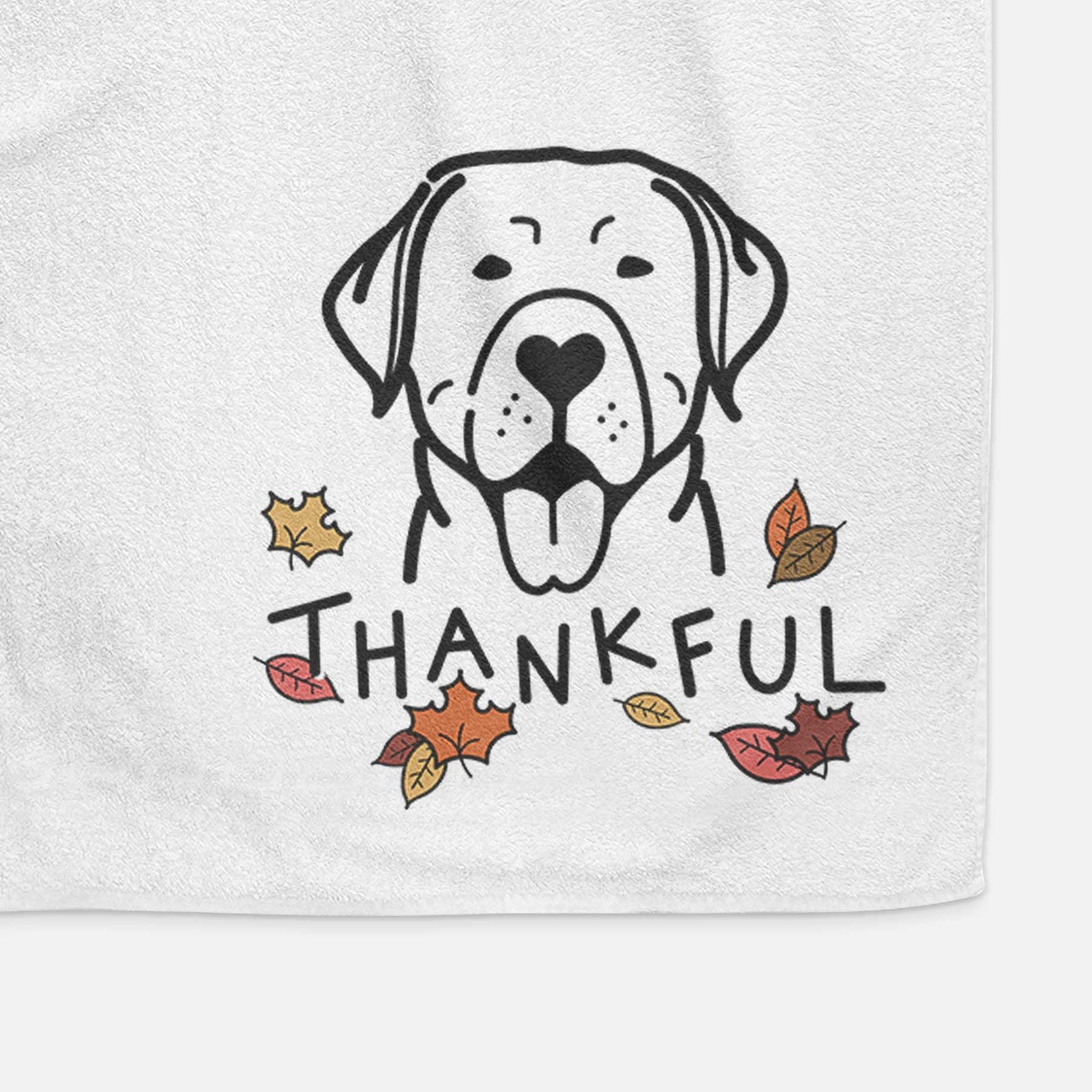 Minimalist line drawing of a Labrador Retriever with 'Thankful' lettering on a decorative hand towel