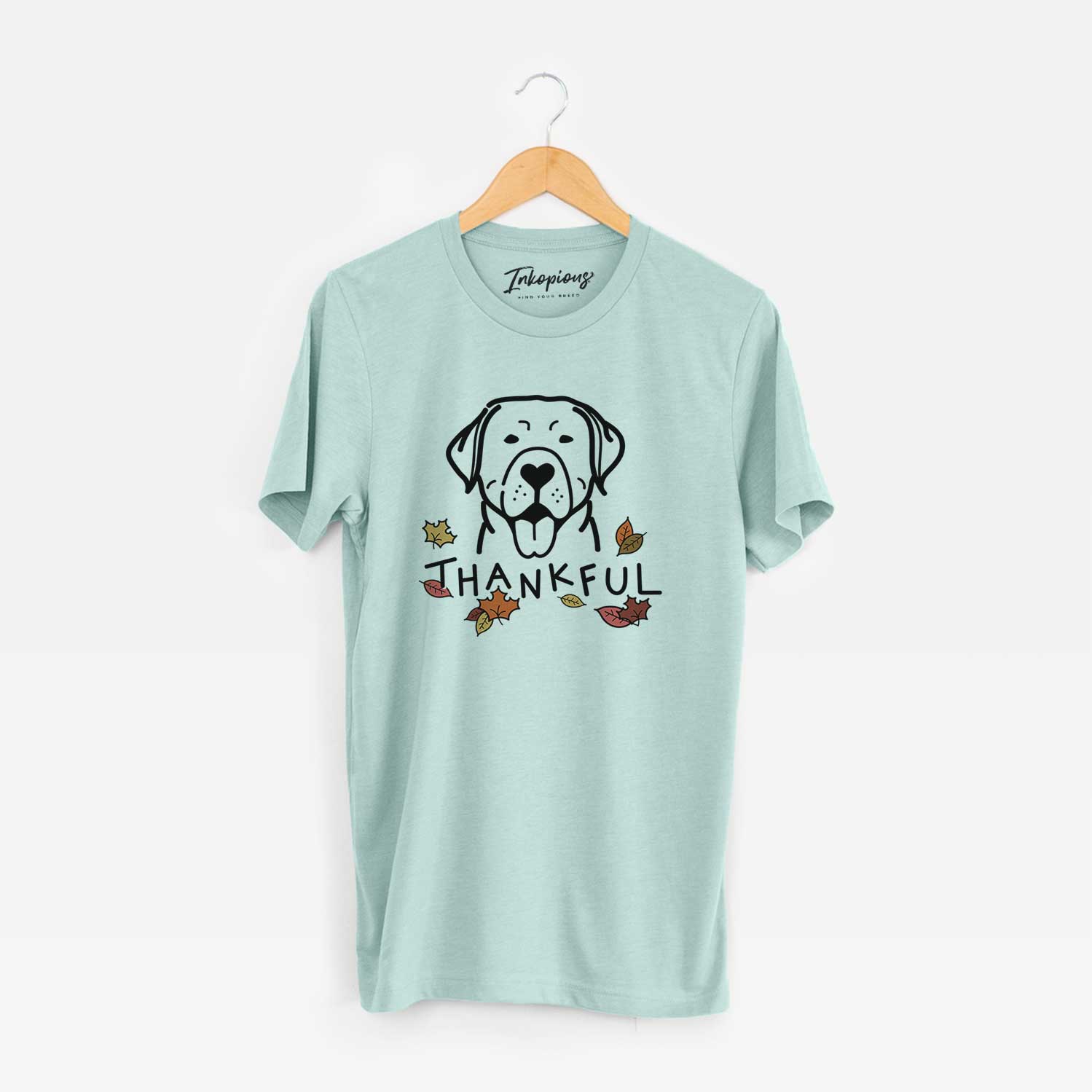 Minimalist line drawing of a Labrador Retriever with 'Thankful' lettering on a Heather Sage Unisex crewneck