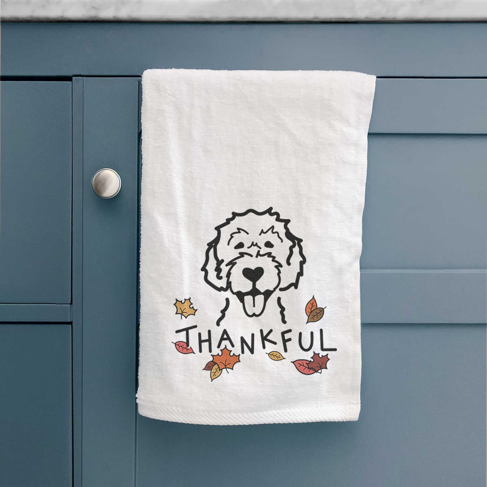Minimalist line drawing of a Labradoodle with 'Thankful' lettering on a decorative hand towel