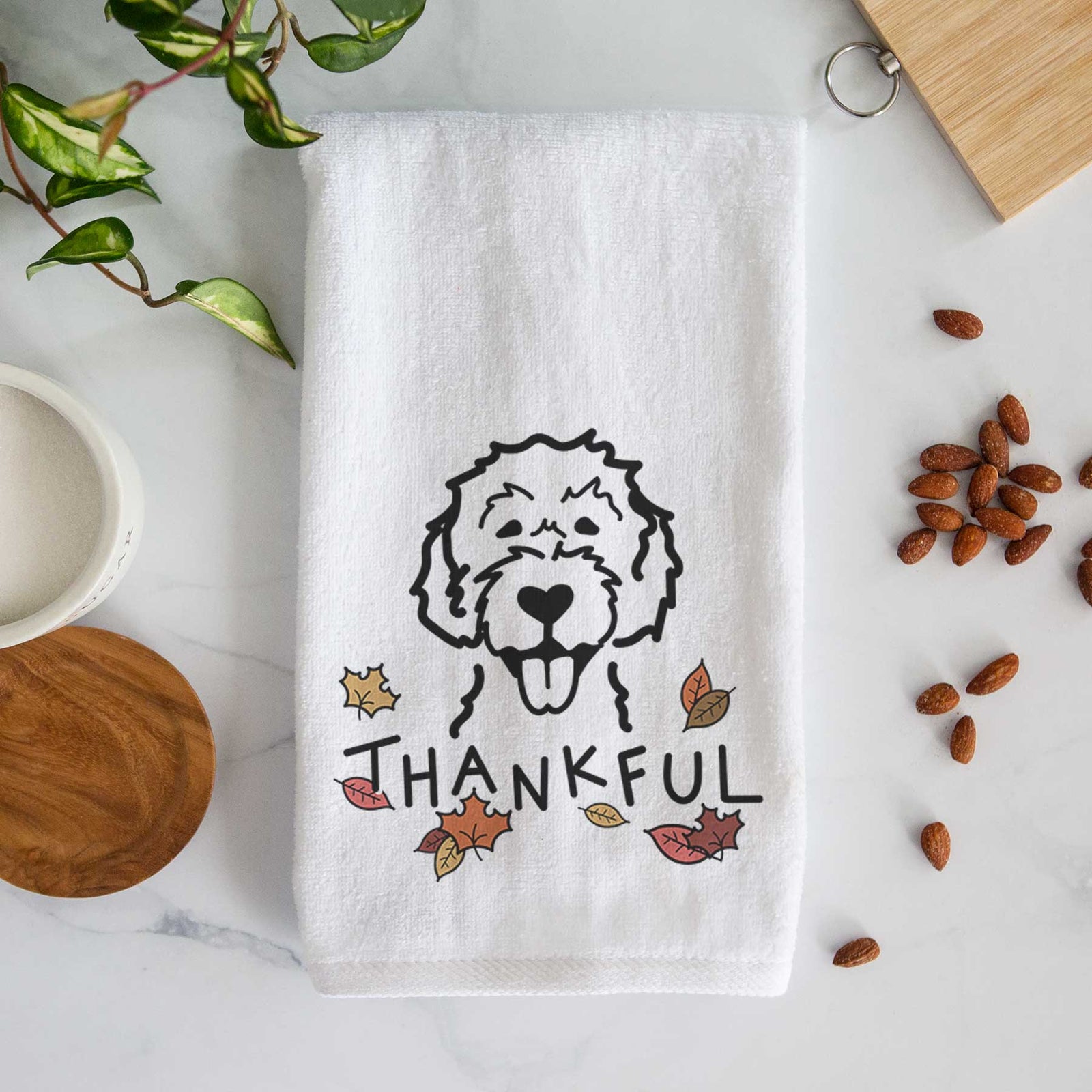 Minimalist line drawing of a Labradoodle with 'Thankful' lettering on a decorative hand towel