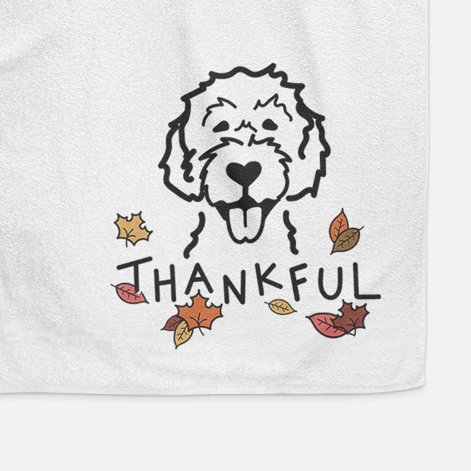 Minimalist line drawing of a Labradoodle with 'Thankful' lettering on a decorative hand towel