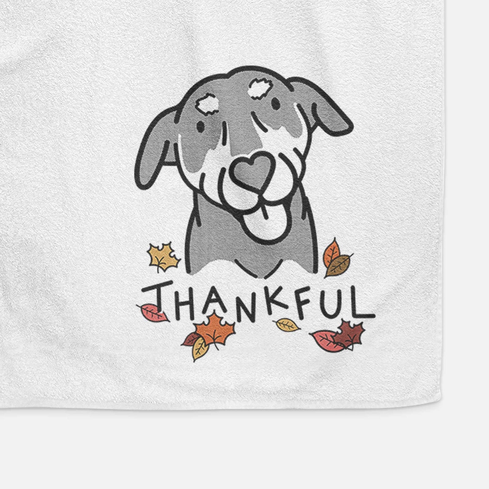 Minimalist line drawing of Lousia the Mixed Breed with 'Thankful' lettering on a decorative hand towel