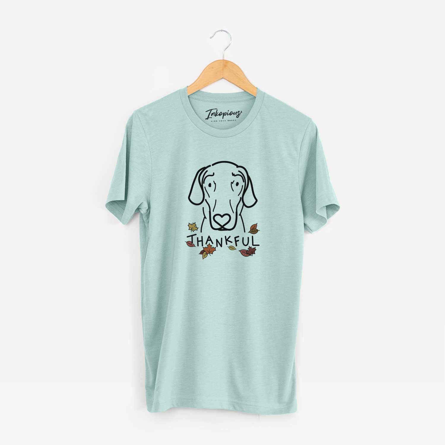 Minimalist line drawing of Lucy the Great Dane with 'Thankful' lettering on a Heather Sage Unisex crewneck